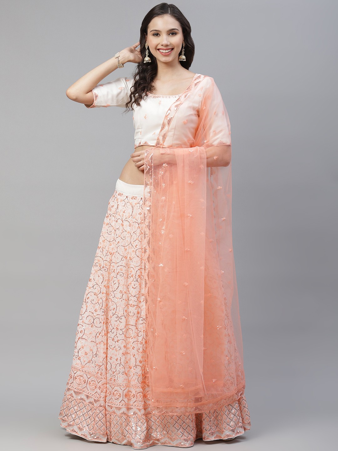 

SHUBHKALA Off White & Peach-Coloured Embellished Sequinned Semi-Stitched Lehenga & Unstitched Blouse With