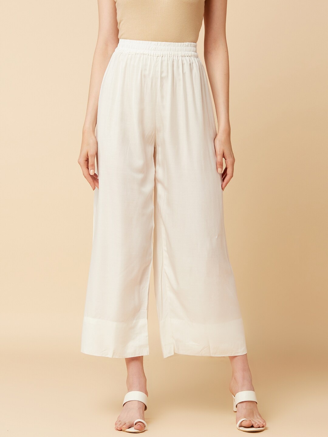

Varanga Women White Solid Wide Leg Palazzos