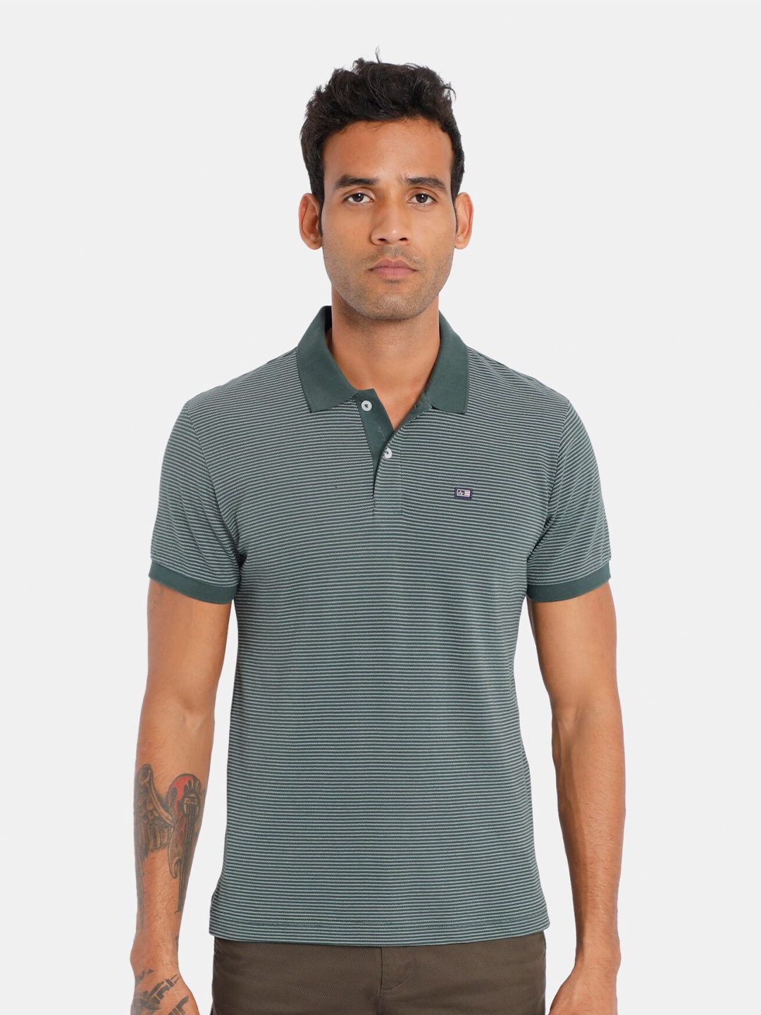 

Arrow Sport Men Green & White Pure Cotton Striped Polo Collar T-shirt