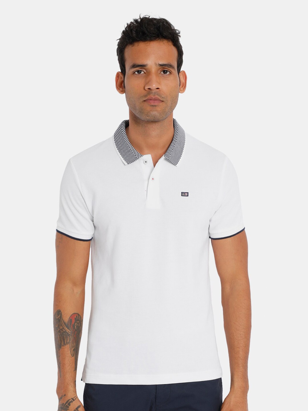 

Arrow Sport Men White Pure Cotton Solid Polo Collar T-shirt