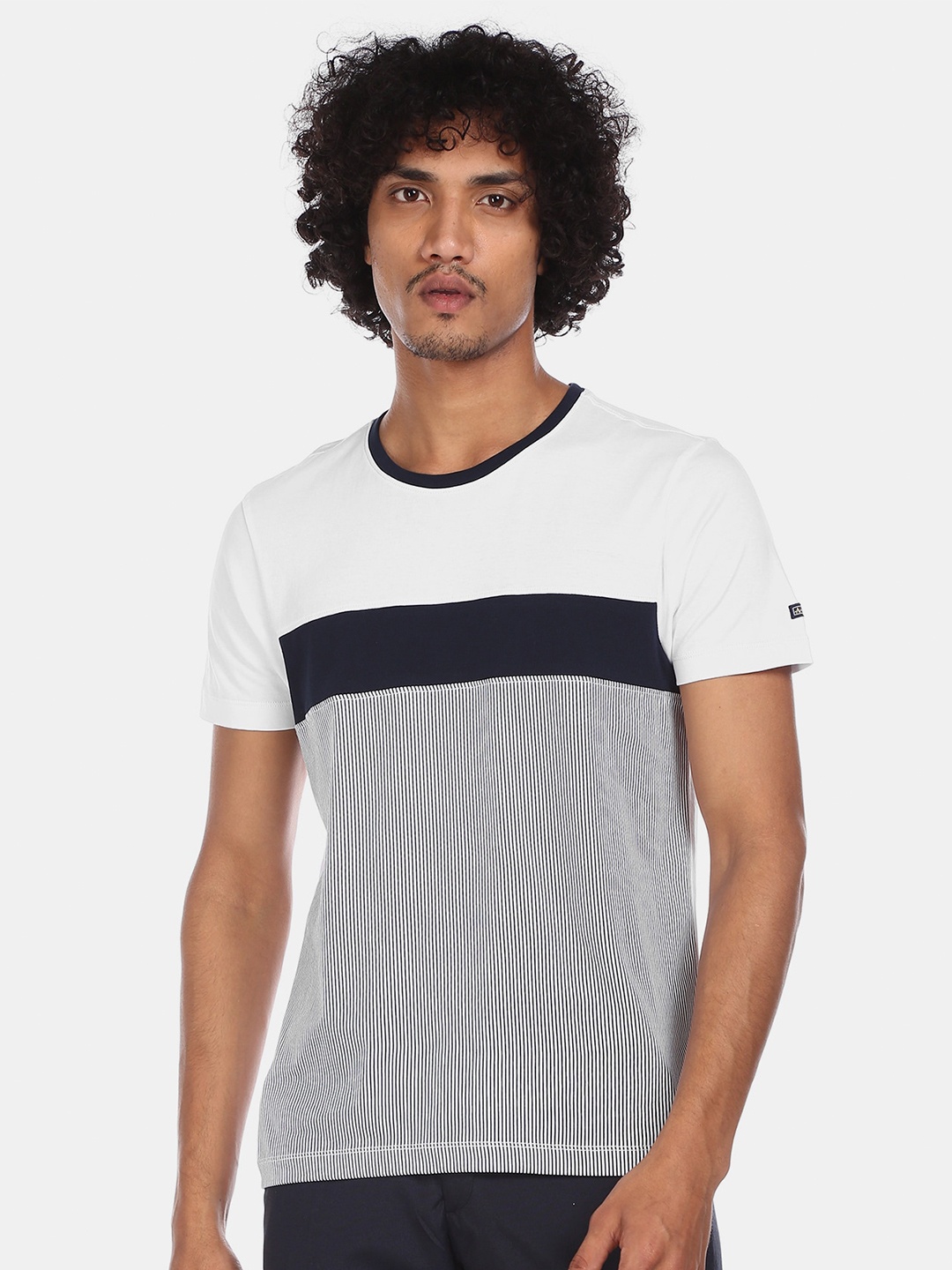 

Arrow Sport Men White & Navy Blue Pure Cotton Striped Round Neck T-shirt