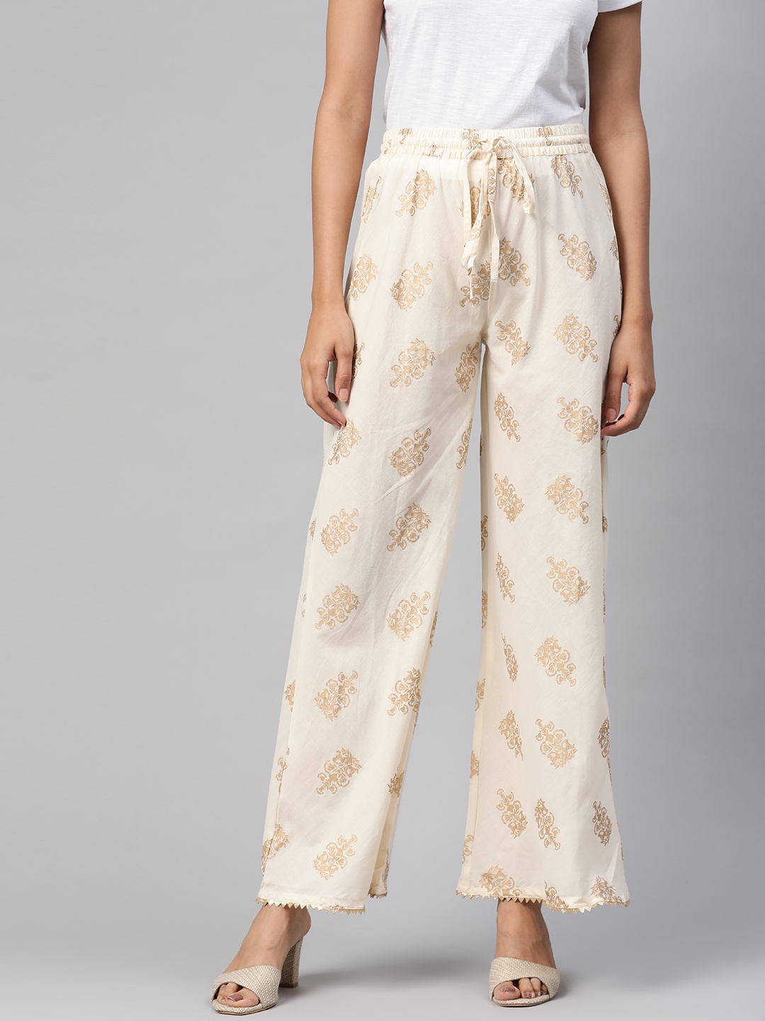 

HERE&NOW Women Cream-Coloured & Golden Cotton Ethnic Motifs Printed Palazzos
