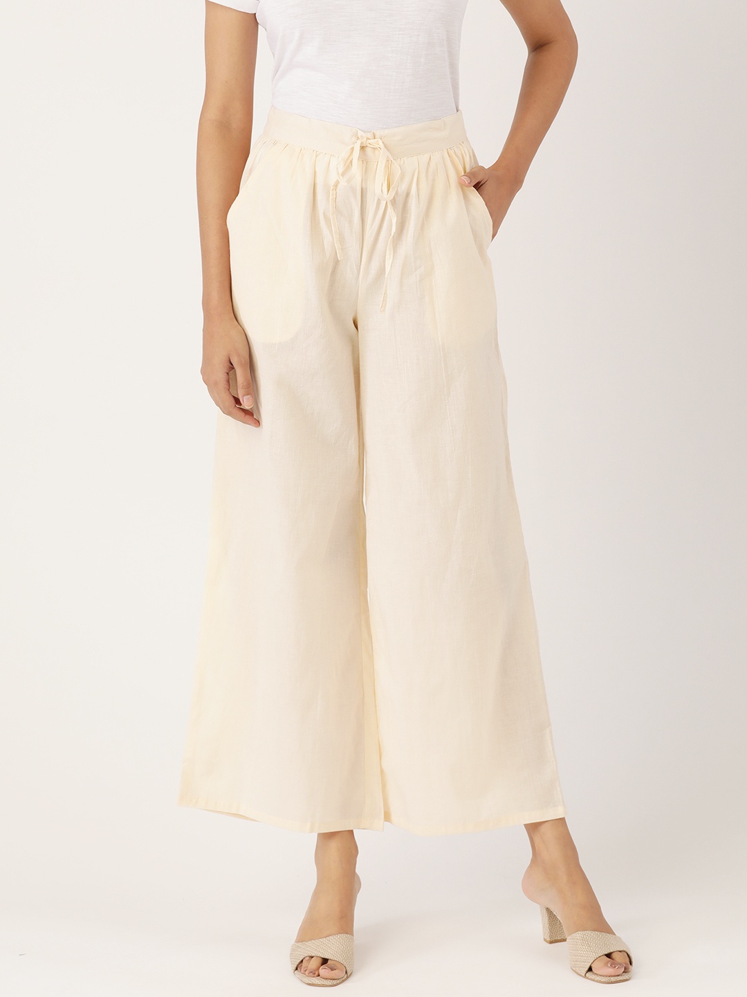 

Moda Rapido Women Off White Pure Cotton Solid Straight Palazzos