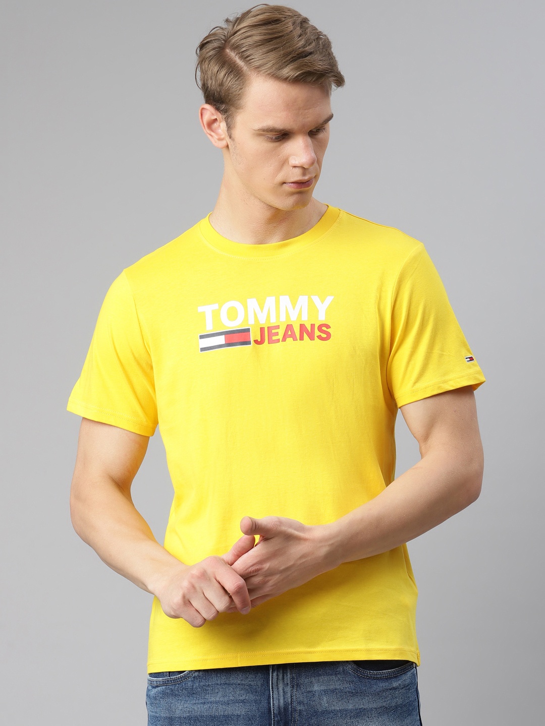 

Tommy Hilfiger Men Yellow Pure Cotton Brand Logo Print Round Neck Pure Cotton T-shirt