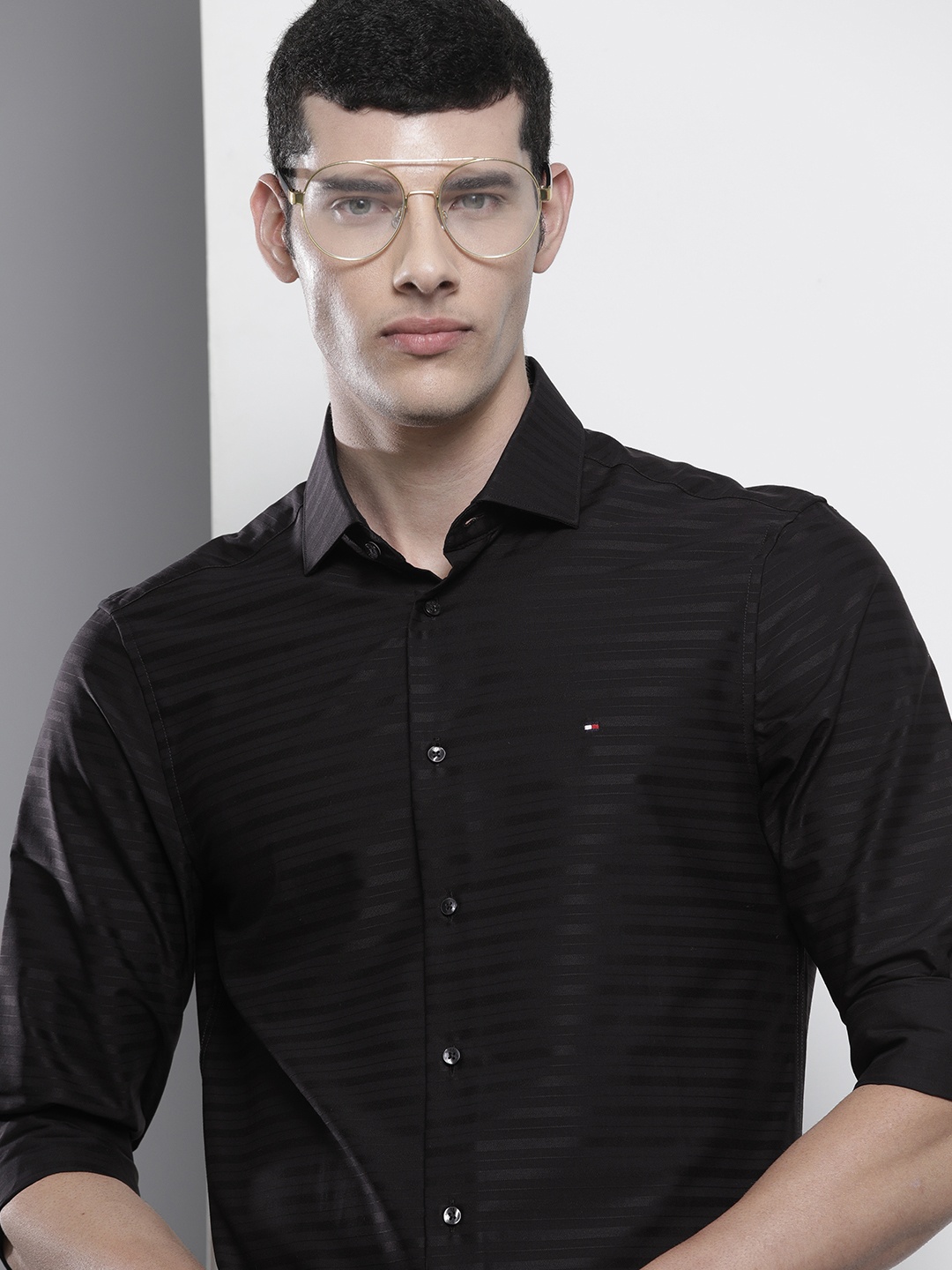 

Tommy Hilfiger Men Black Slim Fit Striped Semiformal Shirt
