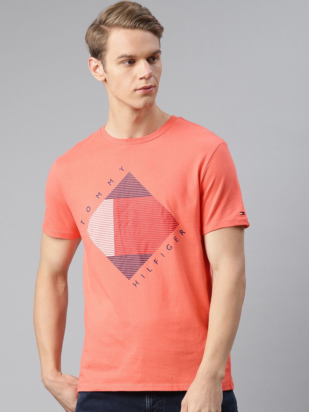 

Tommy Hilfiger Men Peach-Coloured Pure Cotton Printed Round Neck Pure Cotton T-shirt