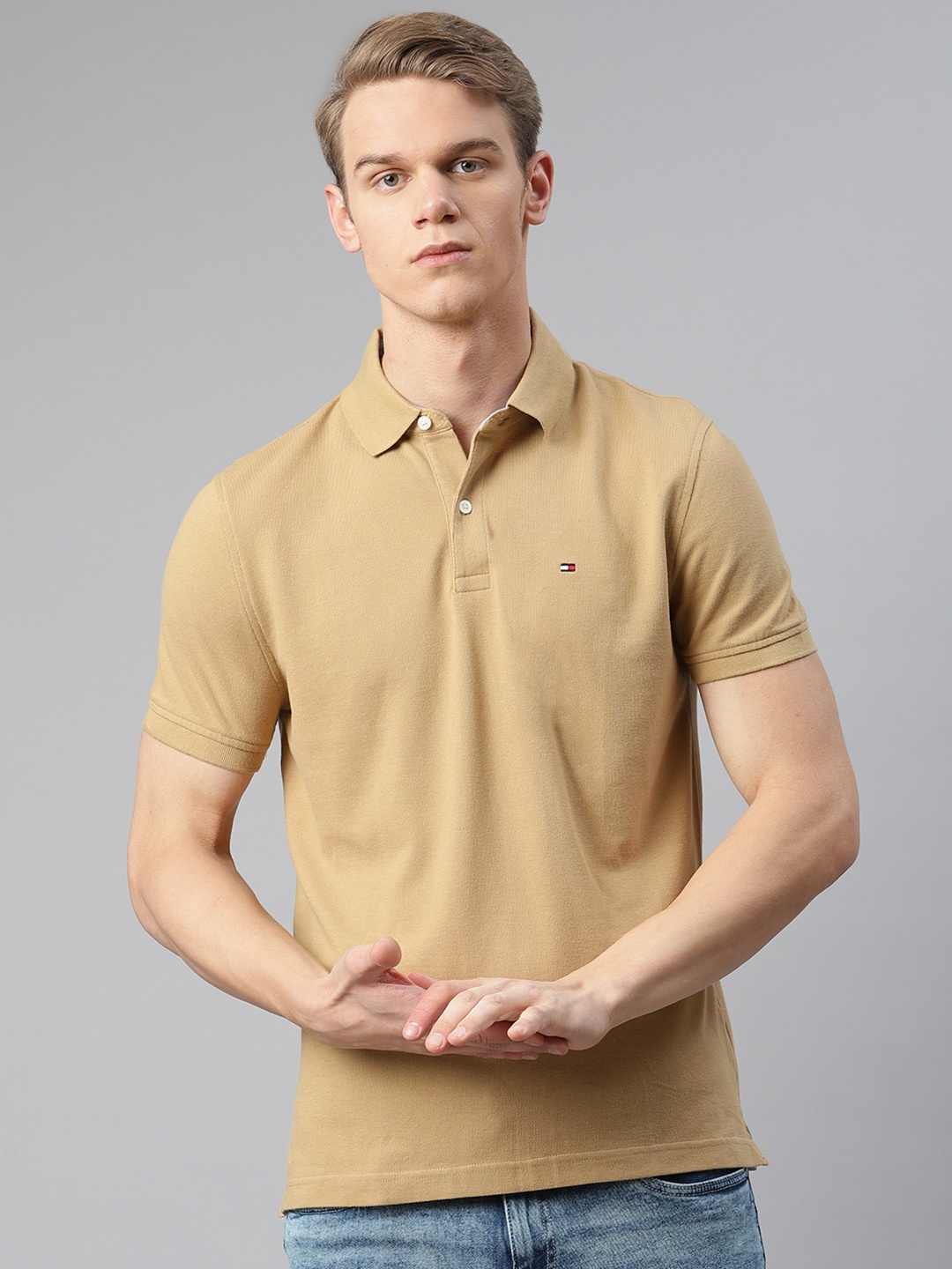 

Tommy Hilfiger Men Beige Cotton Custom Fit Solid Polo Collar Pure Cotton T-shirt