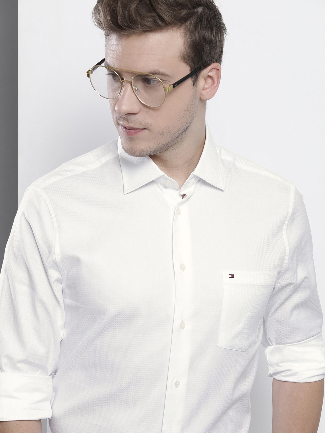 

Tommy Hilfiger Men White Solid Pure Cotton Opaque Semiformal Shirt