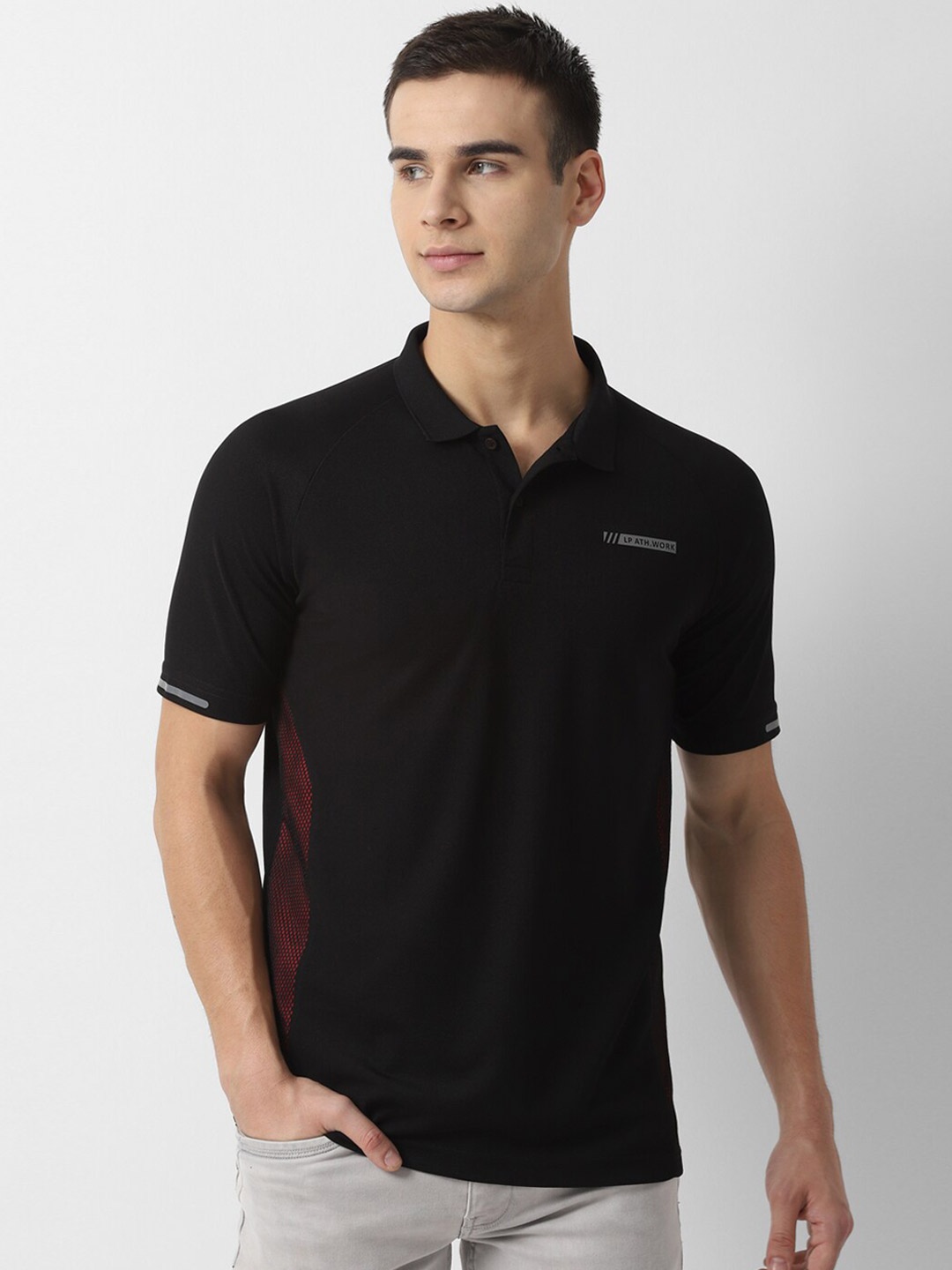 

Louis Philippe Sport Men Black Solid Polo Collar T-shirt