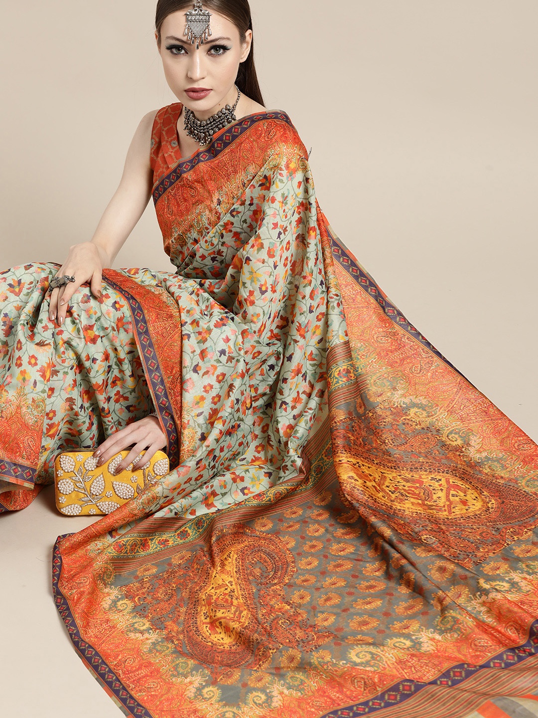 

Saree mall Sea Green & Orange Paisley Pochampally Sarees