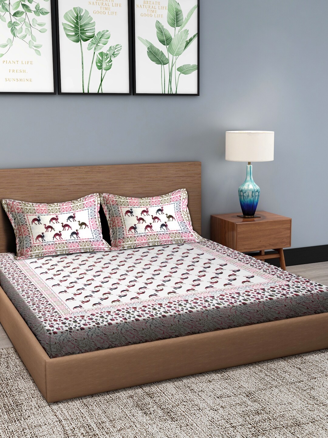 

Rajasthan Decor White & Pink Abstract 120 TC Cotton 1 Queen Bedsheet with 2 Pillow Covers