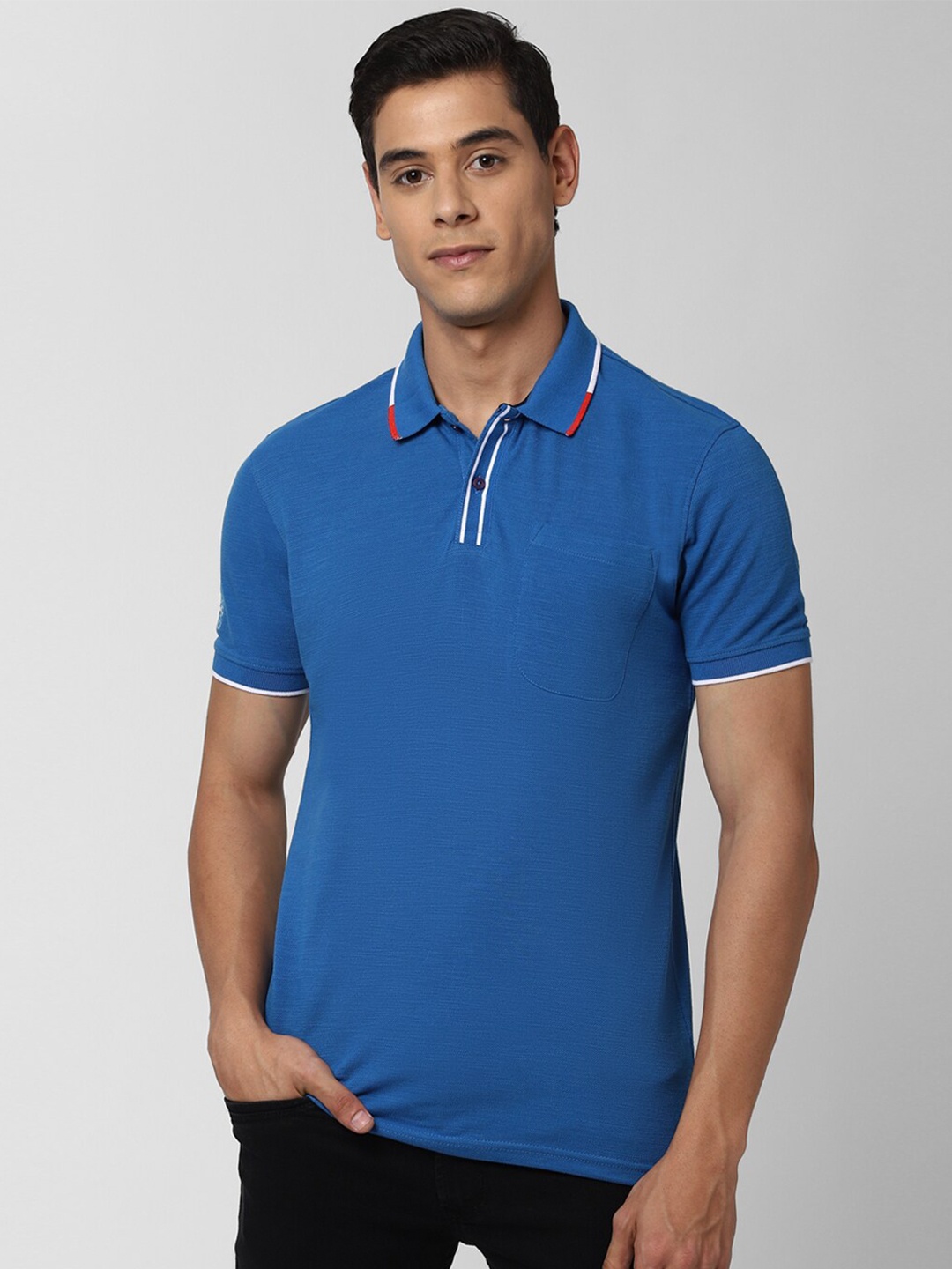 

Peter England Casuals Men Blue Solid Polo Collar T-shirt