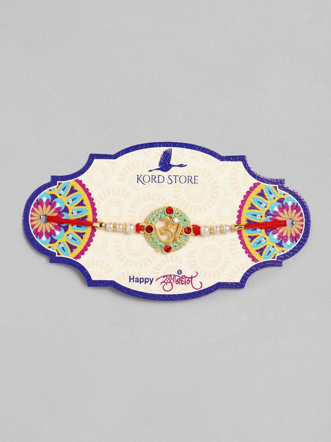

Kord Store Boys Gold-Toned & Green Om Design Ruby Stoned Studded Rakhi