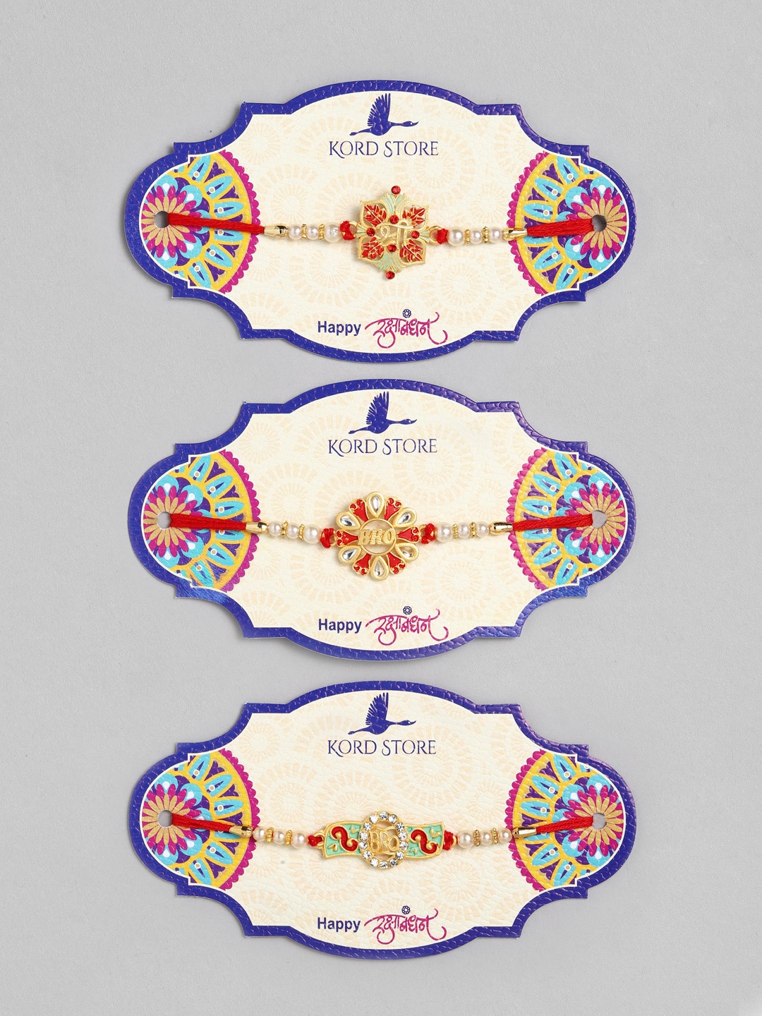 

Kord Store Set of 3 Red & Green Ruby Studded Beaded Thread Rakhi
