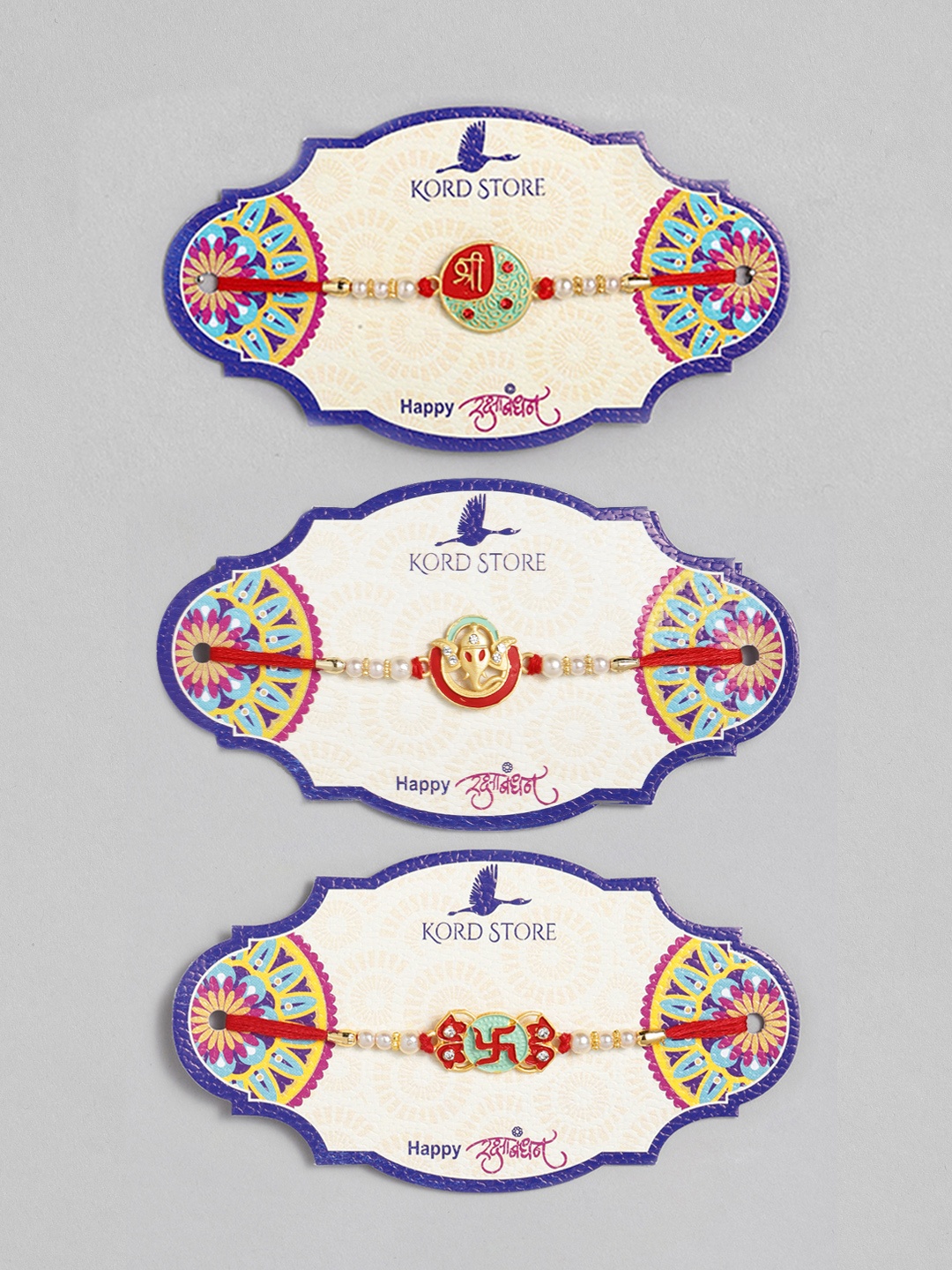 

Kord Store Set of 3 Gold-Plated Ganeshji Swastik and Shree Mark Meenakari Rakhi, Red