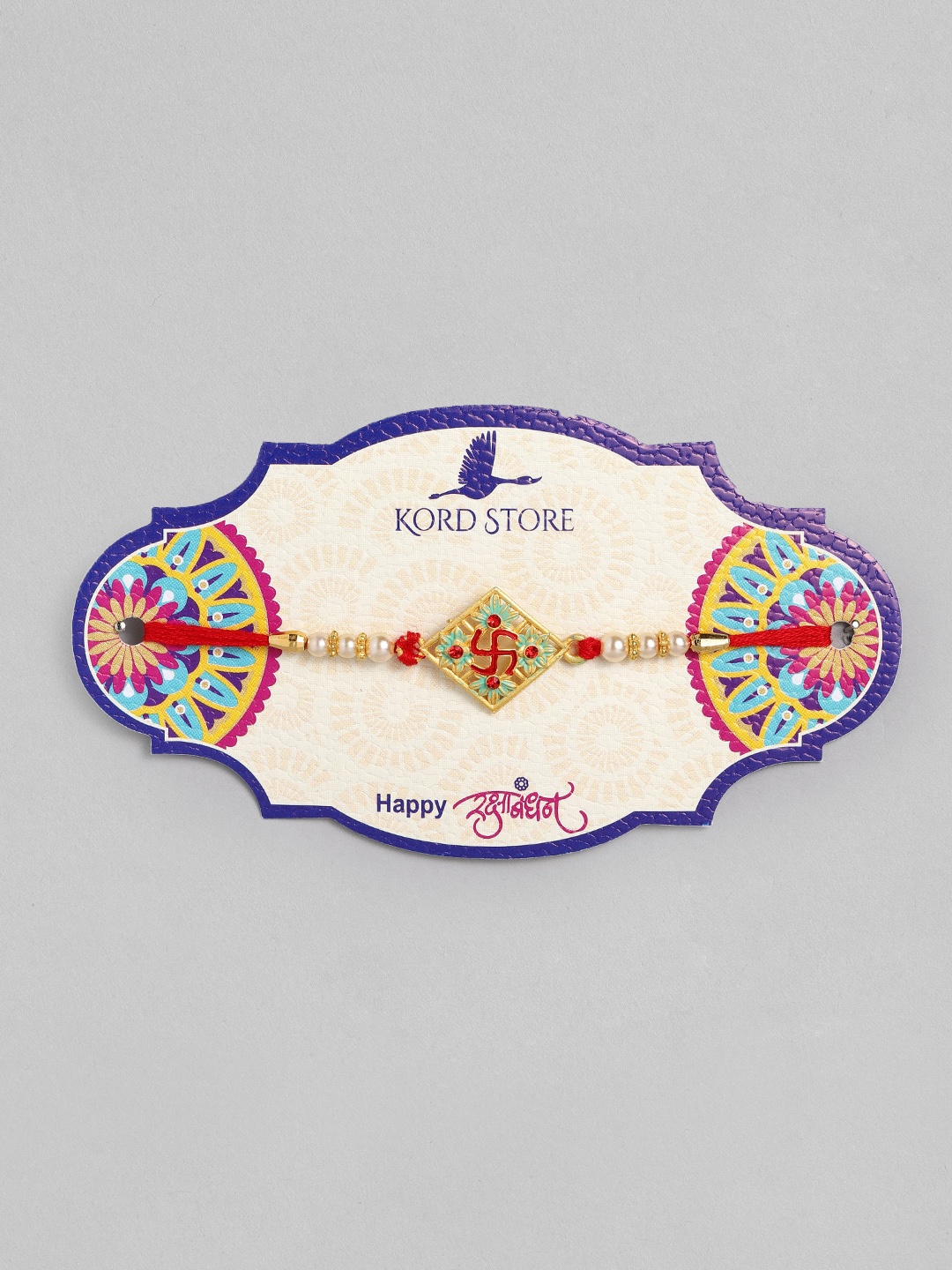 

Kord Store Red & Green Swastik Beaded Thread Rakhi