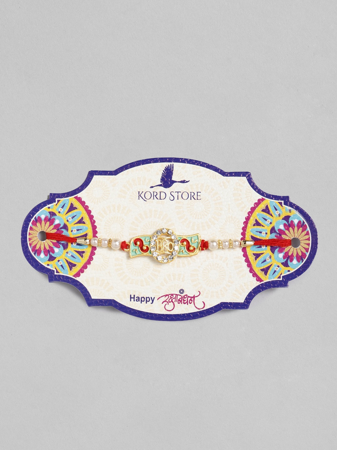 

Kord Store Red & Green Enamelled Bro Mark Ruby Stoned Thread Rakhi