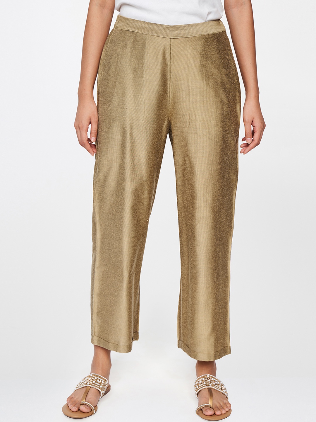 

Global Desi Women Gold-Coloured Solid Trousers