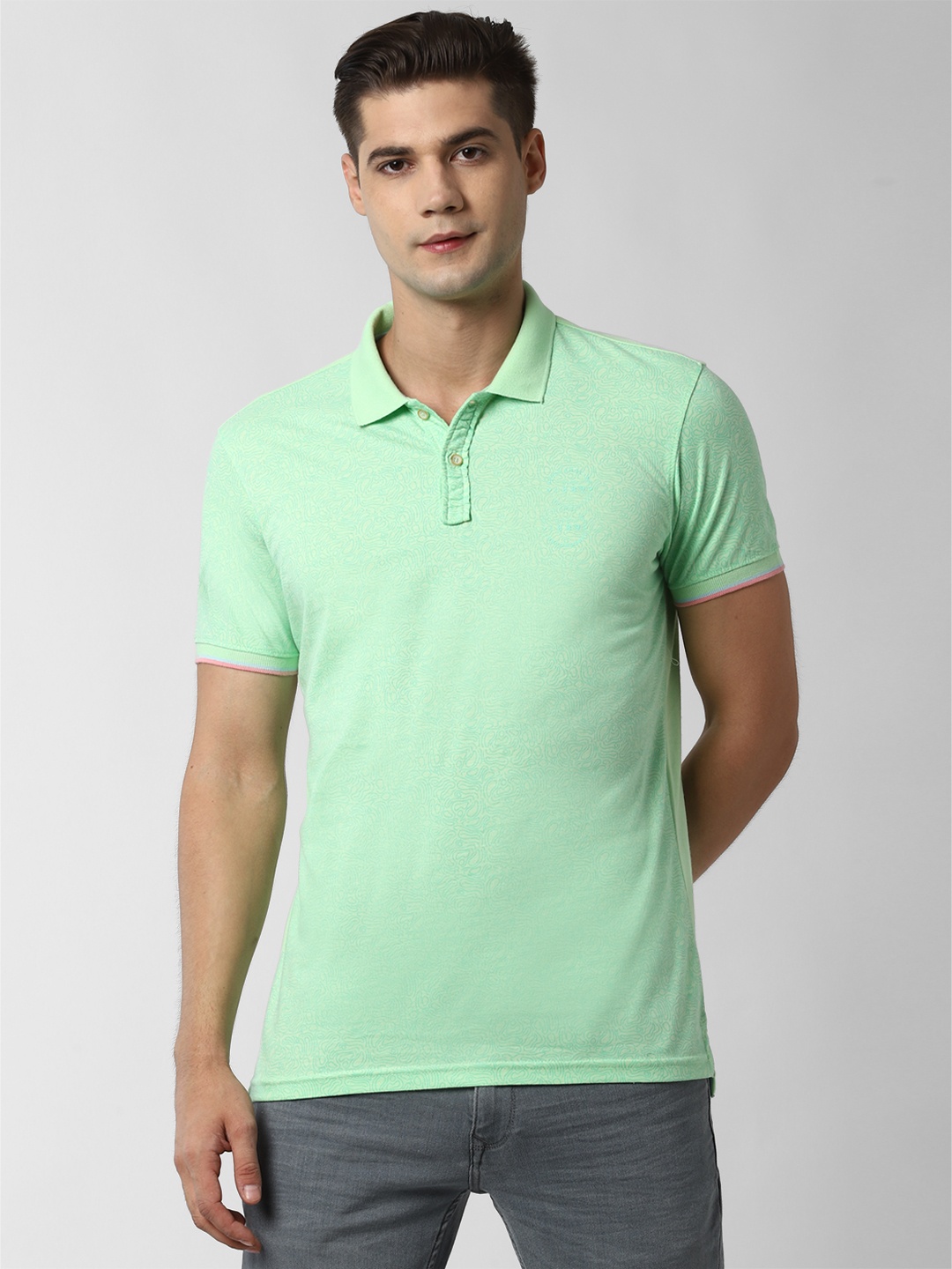 

Peter England Casuals Men Green Printed Polo Collar T-shirt