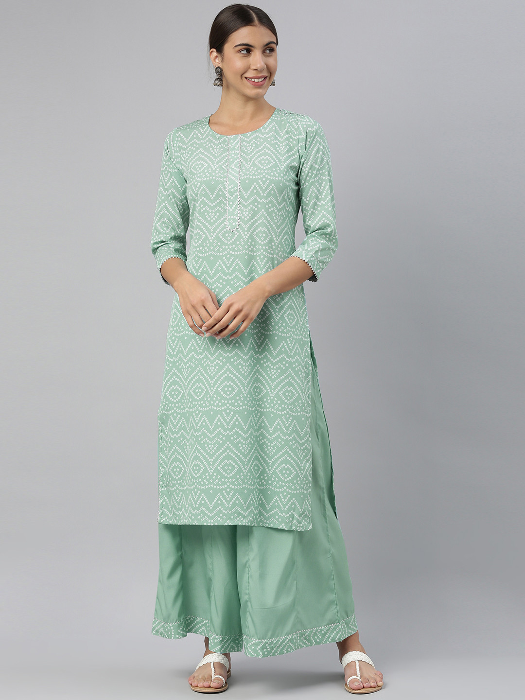 

AHIKA Women Turquoise Blue Bandhani Printed Kurta with Palazzos