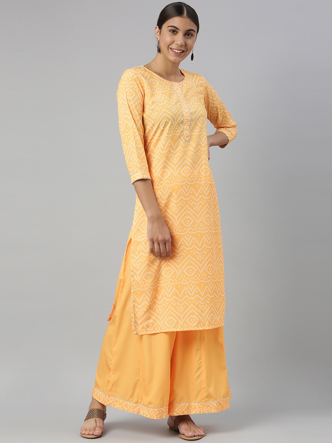 

AHIKA Women Yellow Bandhani Printed Kurta with Palazzos