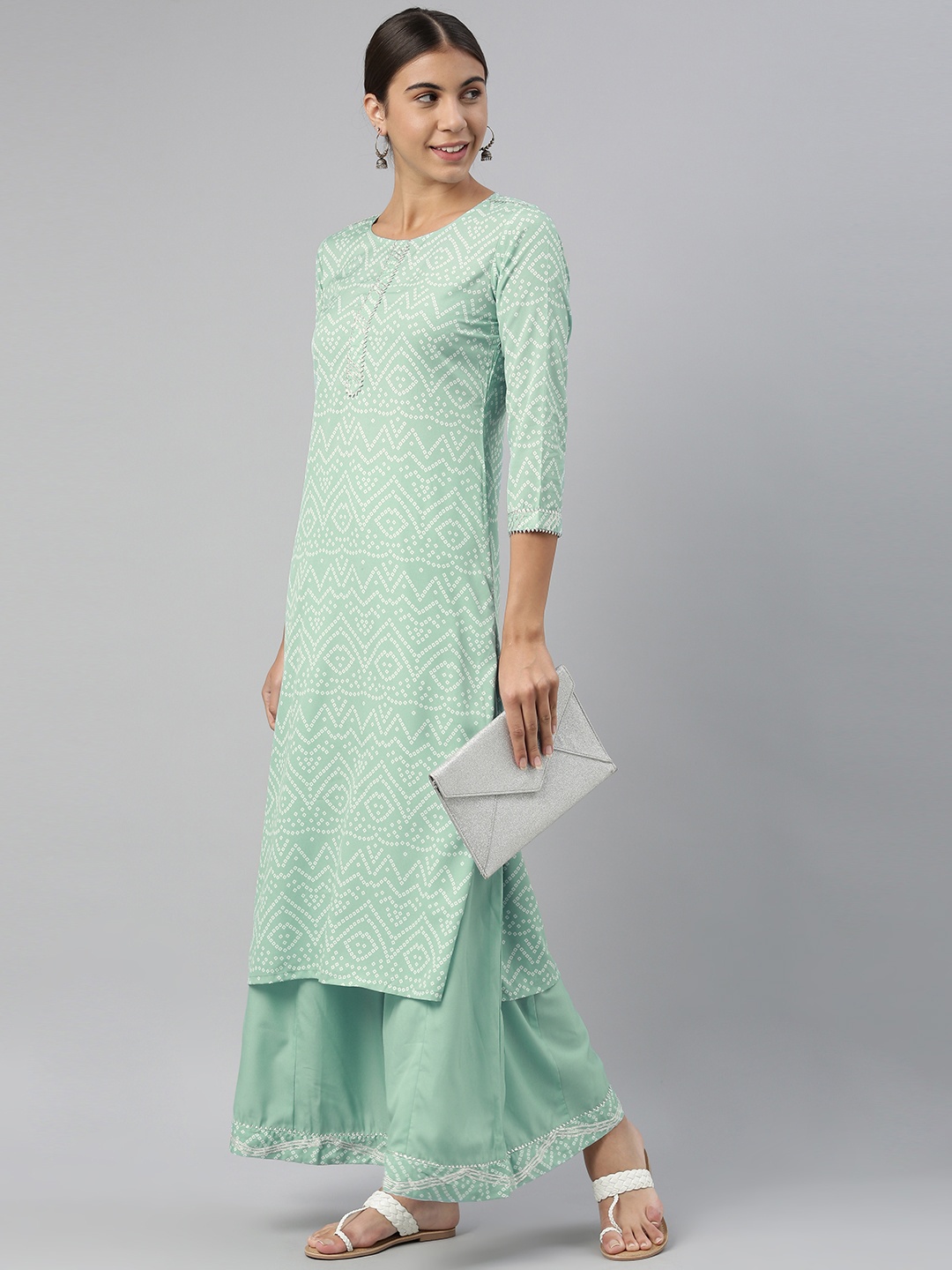 

AHIKA Women Turquoise Blue Bandhani Printed Kurta with Palazzos