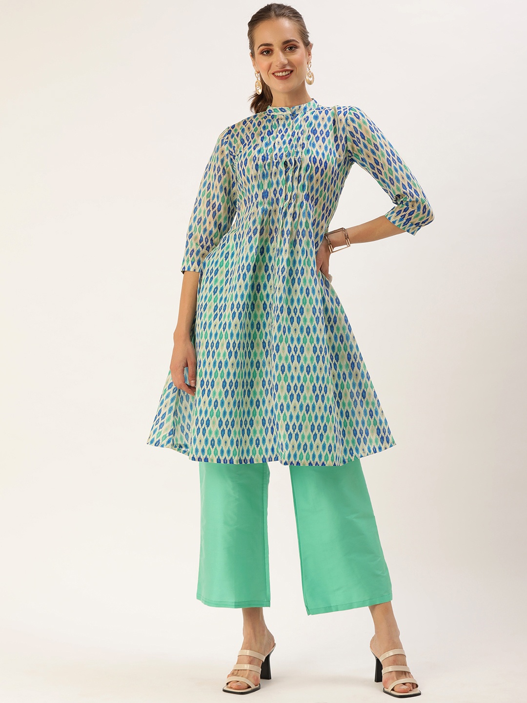 

Ethnovog Women Blue Ethnic Motifs Printed Kurta with Palazzos