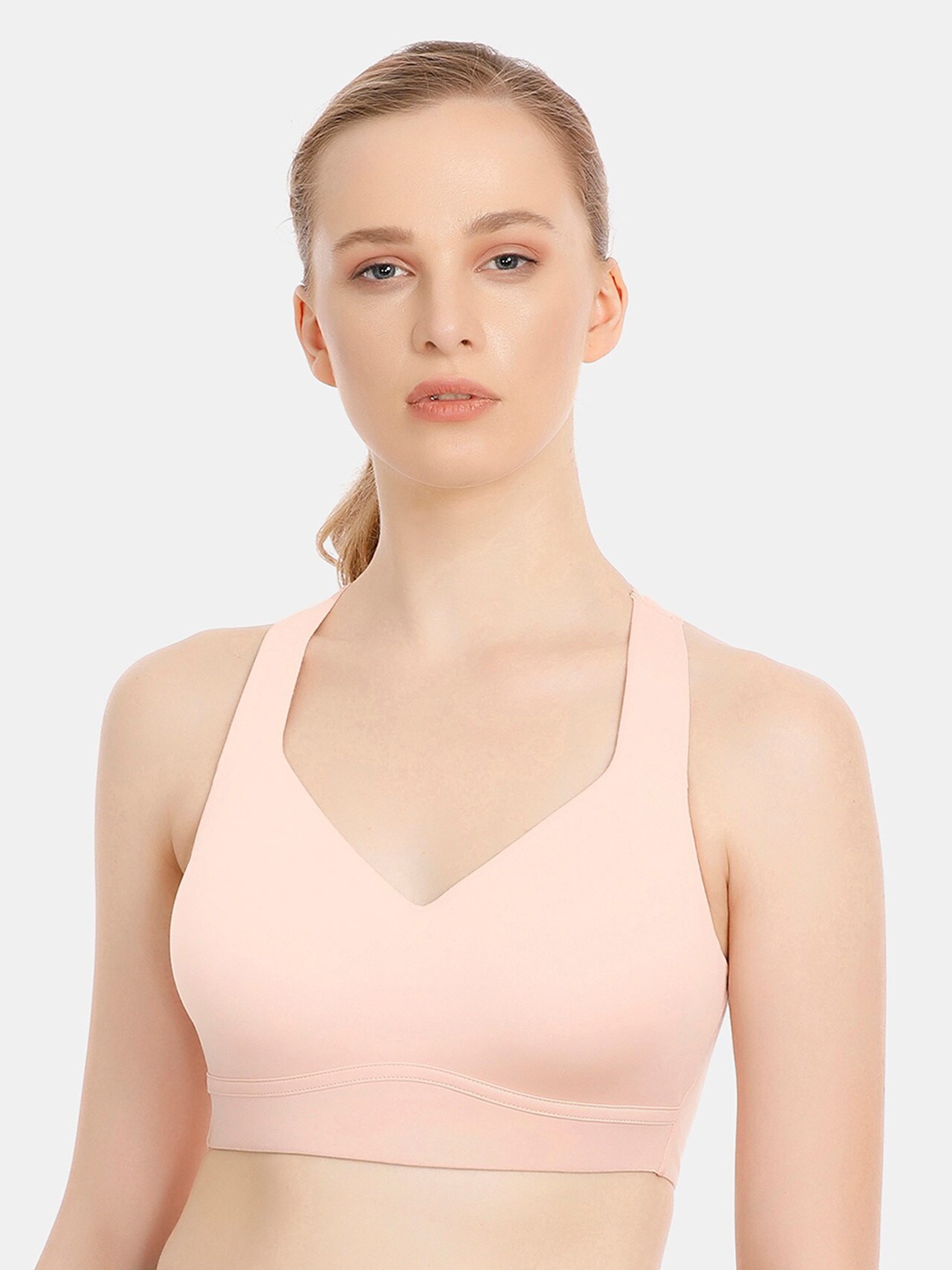 

Zelocity by Zivame Pink Solid Non-Wired Lightly Padded Sports Bra ZC4279FASH0NUDE