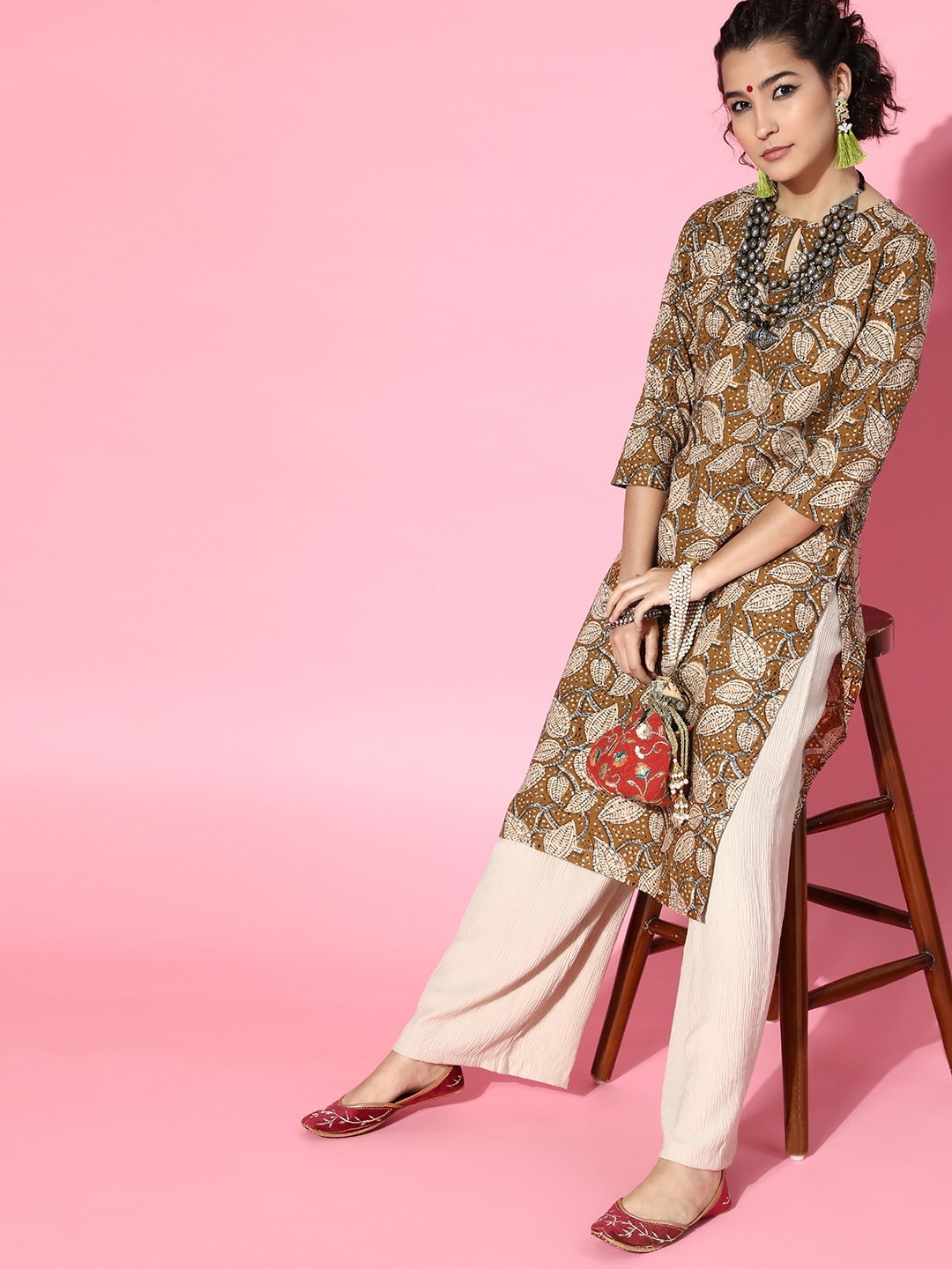 

Moda Rapido Women Mustard Yellow & Beige Ethnic Motifs Printed Keyhole Neck Kurta