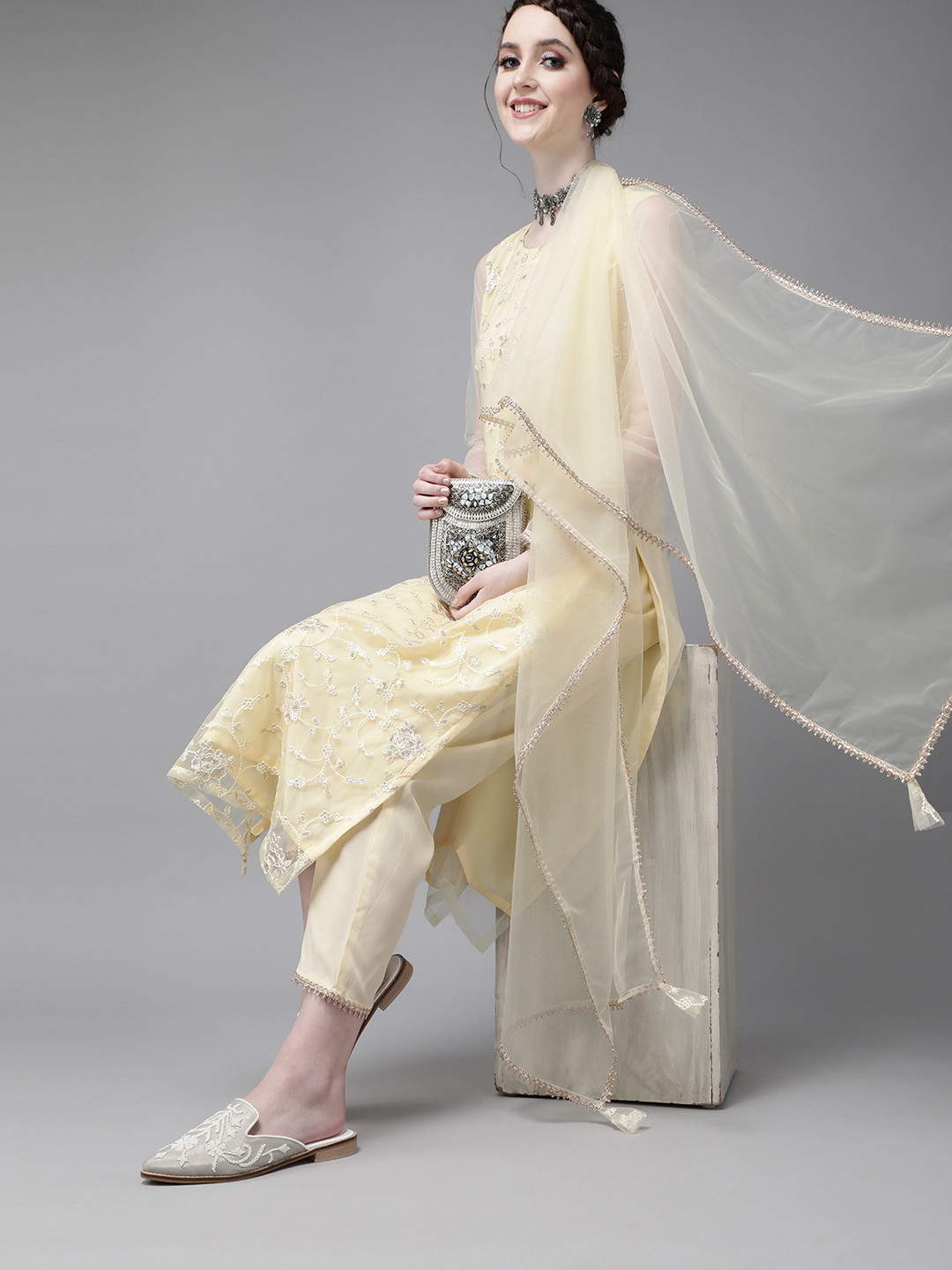 

Indo Era Women Yellow Ethnic Motifs Embroidered Thread Work Kurta with Trousers & Dupatta