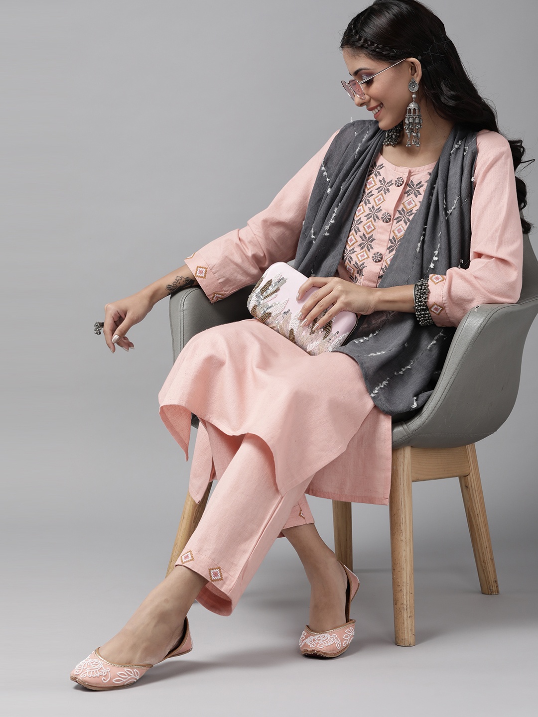 

Indo Era Women Pink & Grey Yoke Design Thread Work Kurta with Trousers & Dupatta