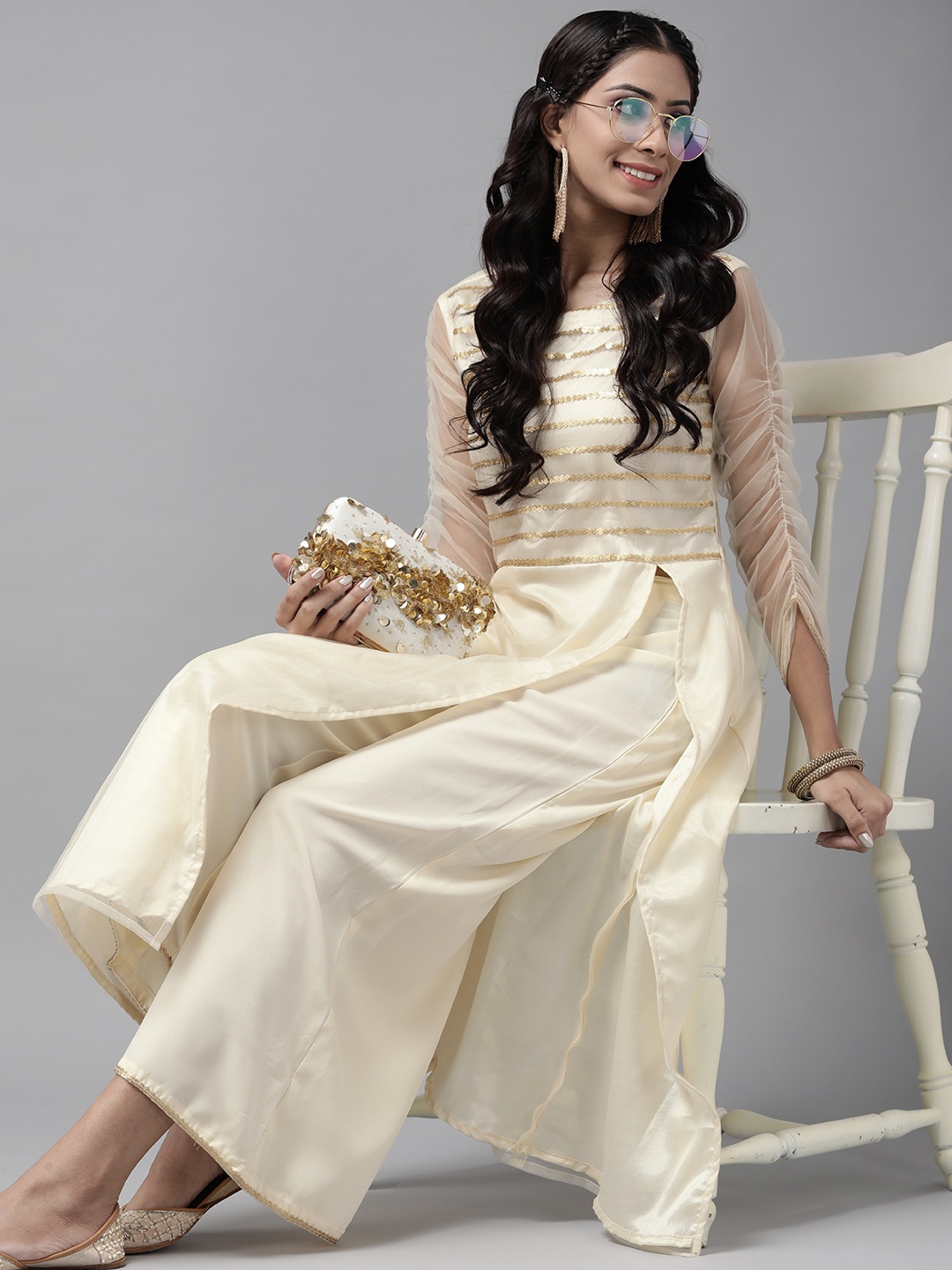 

Indo Era Women Off White Embroidered Kurta with Palazzos