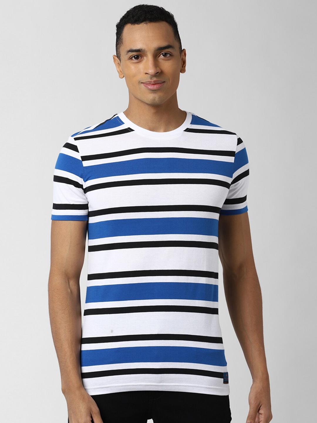 

Peter England Casuals Men White Striped Round Neck T-shirt