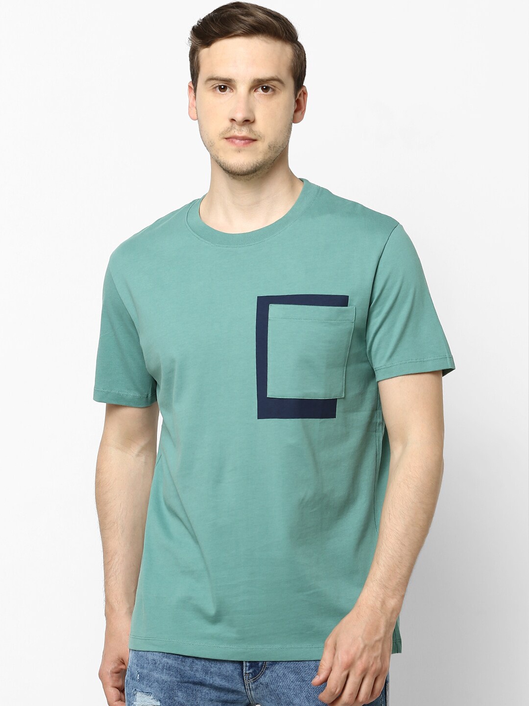 

Celio Men Green Solid Round Neck T-shirt