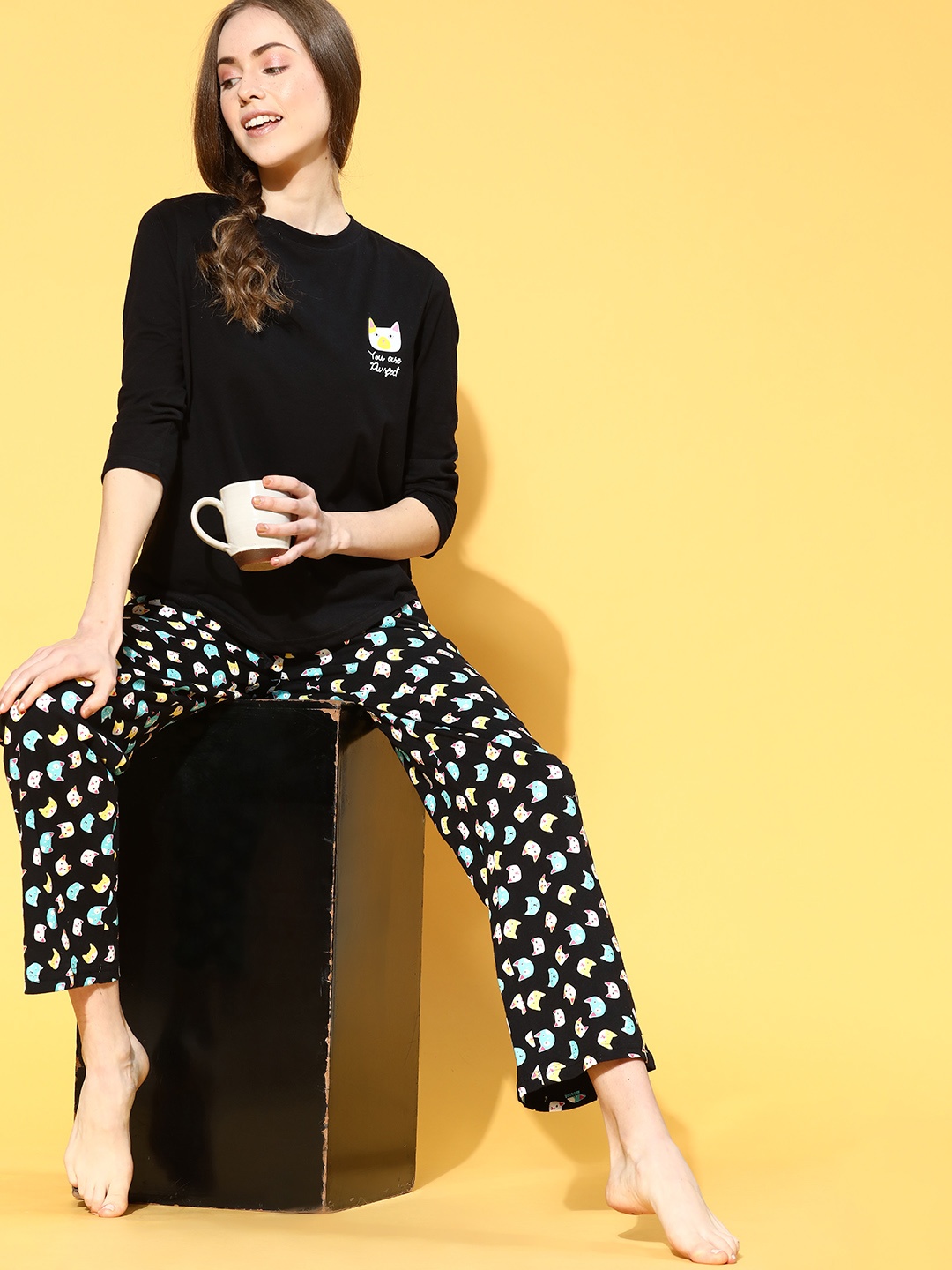 

DressBerry Women Black Solid Printed Night Suit