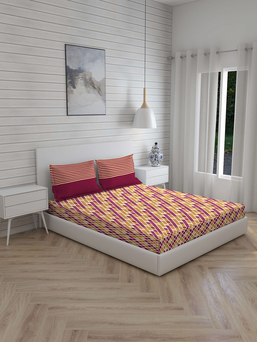 

Layers Magenta & Mustard Geometric 104 TC Cotton 1 Queen Bedsheet with 2 Pillow Covers