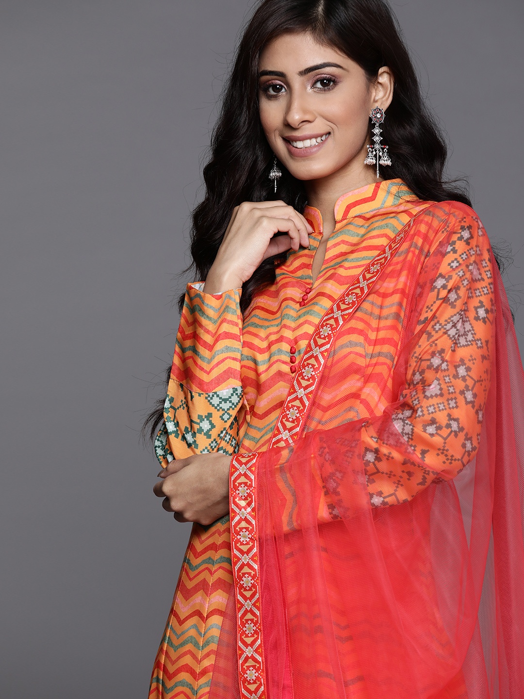

Inddus Women Orange & Green Chevron Print Panelled Anarkali Kurta with Net Dupatta