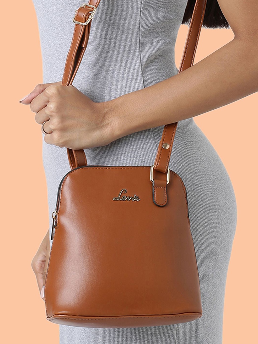 

Lavie Merlin Tan Vertical Dome Structured Sling Bag
