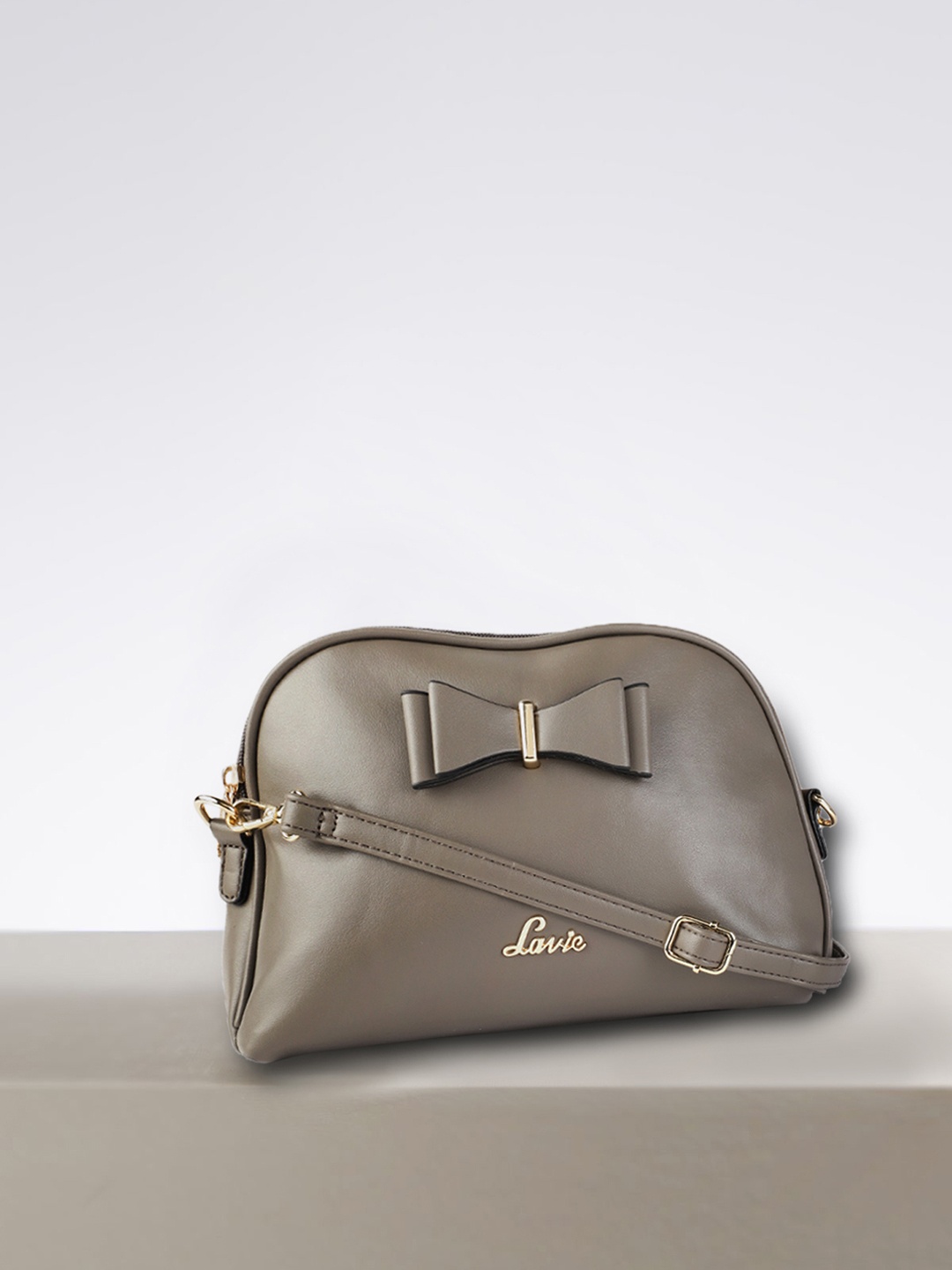 

Lavie Taupe Solid Sling Bag with Bow Detail
