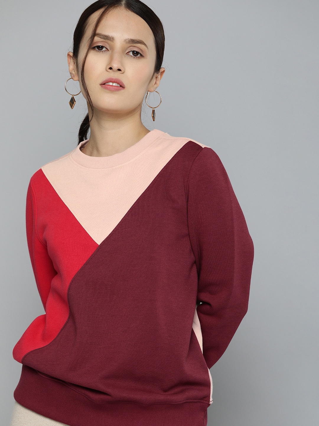 

Chemistry Women Maroon & Red Colourblocked Sweatshirt