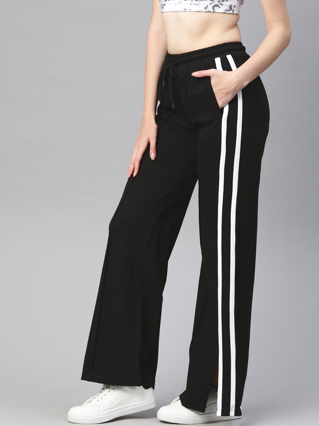 

VividArtsy Women Black Solid Pure Cotton Wide Track Pants with Striped Details