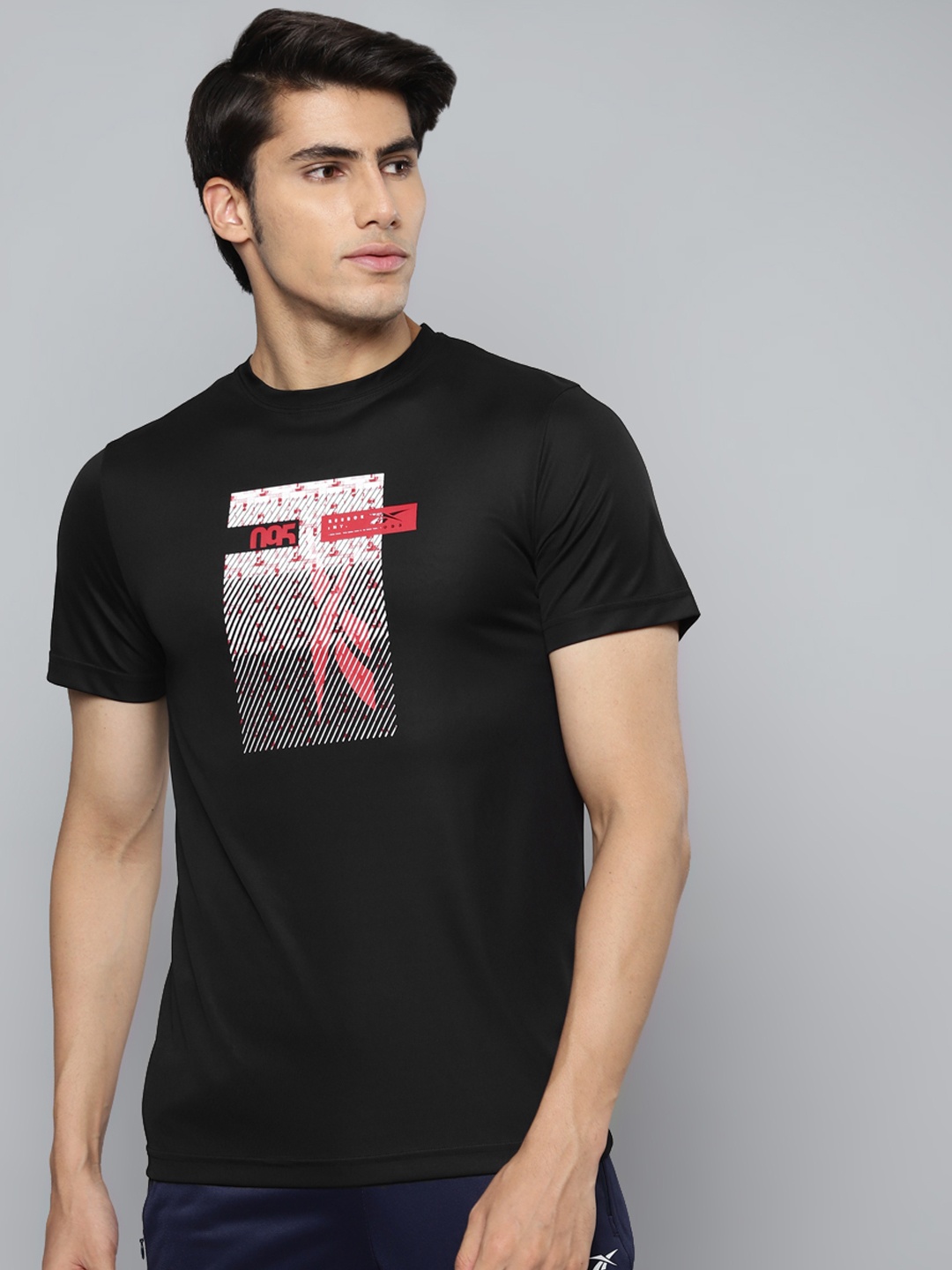

Reebok Men Black & White Printed Slim Fit Training Elements Basic T-shirt