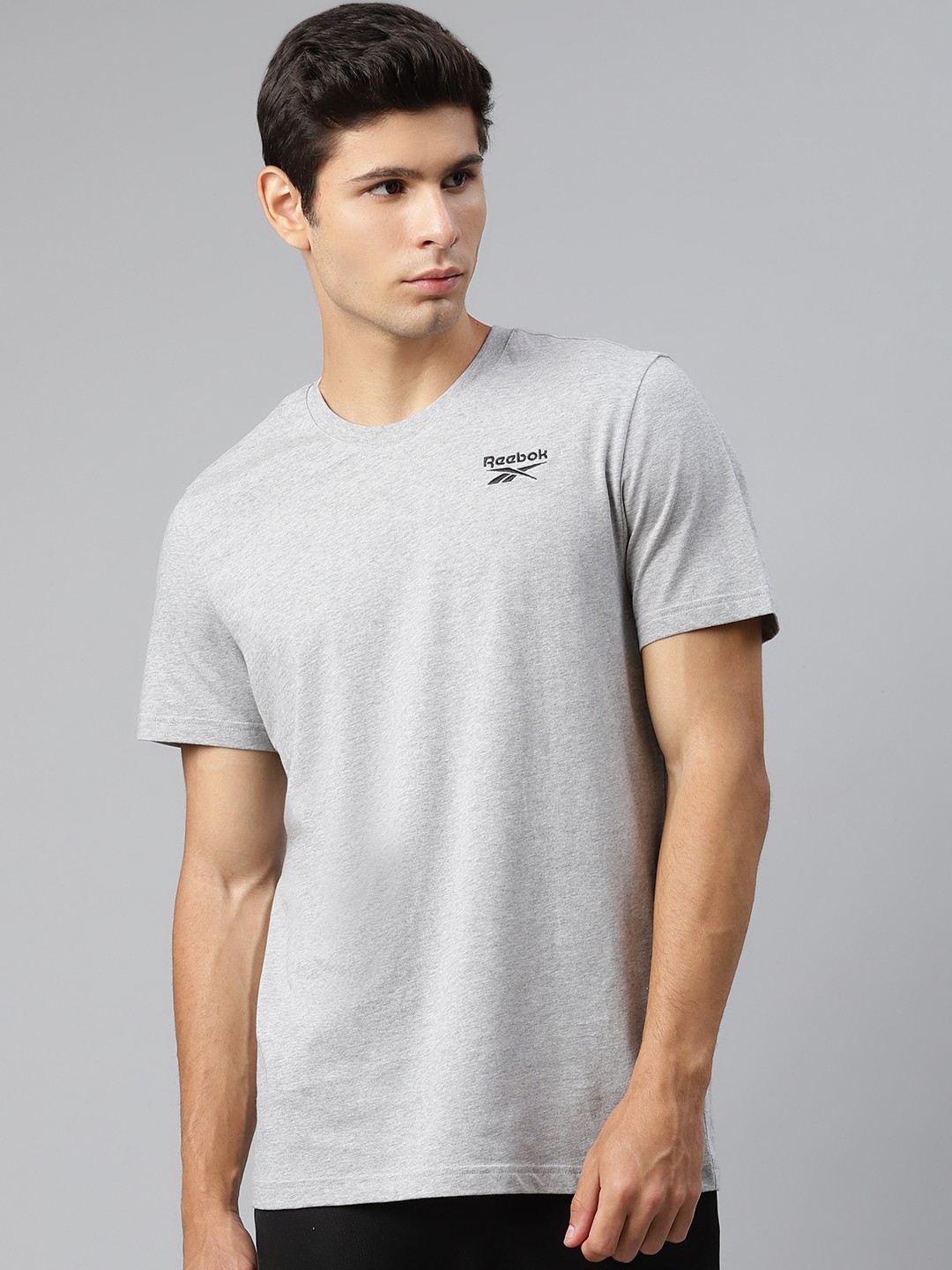 

Reebok Men Grey Solid Training or Gym T-shirt