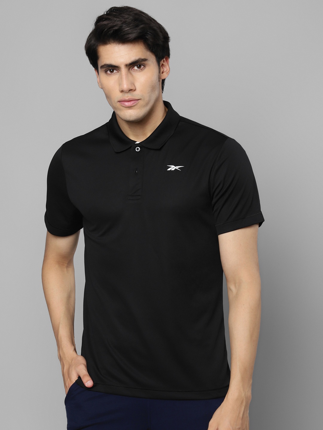 

Reebok Men Black Brand Logo Polo Collar Slim Fit Training BAS POLO Sustainable T-shirt