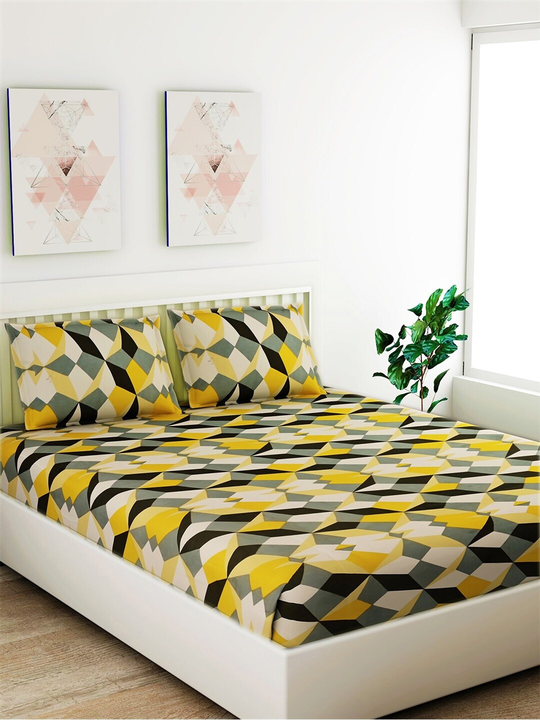 

Salona Bichona Yellow & Black Geometric 104 TC Cotton 1 Queen Bedsheet with 2 Pillow Covers