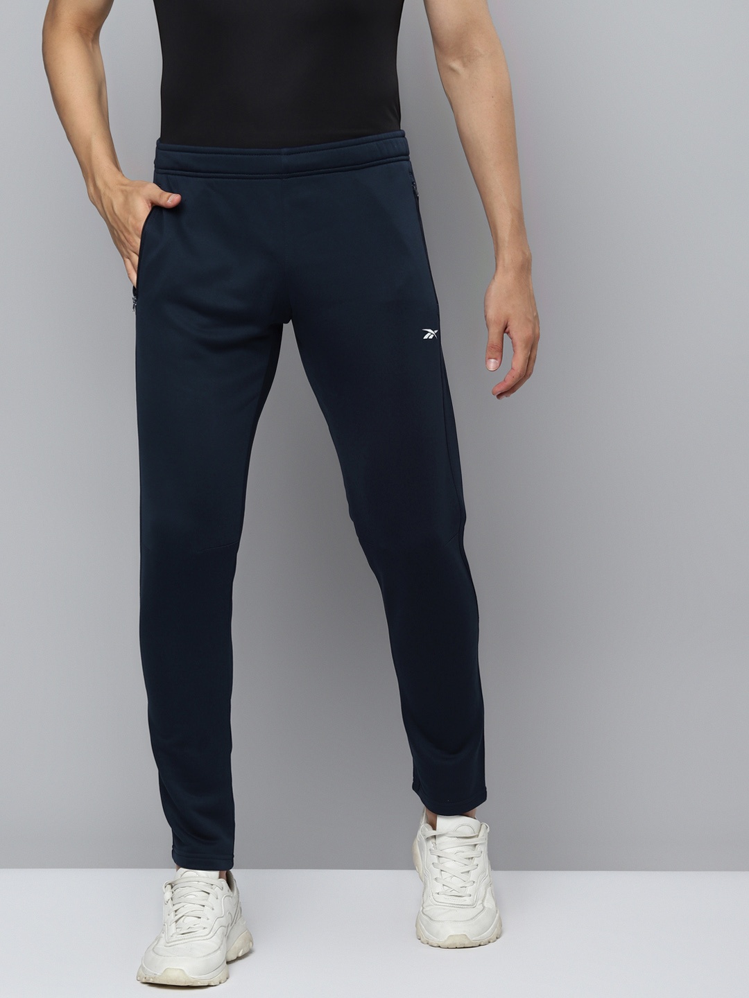 

Reebok Men Navy Blue Solid FON BAS Slim Fit Track Pants