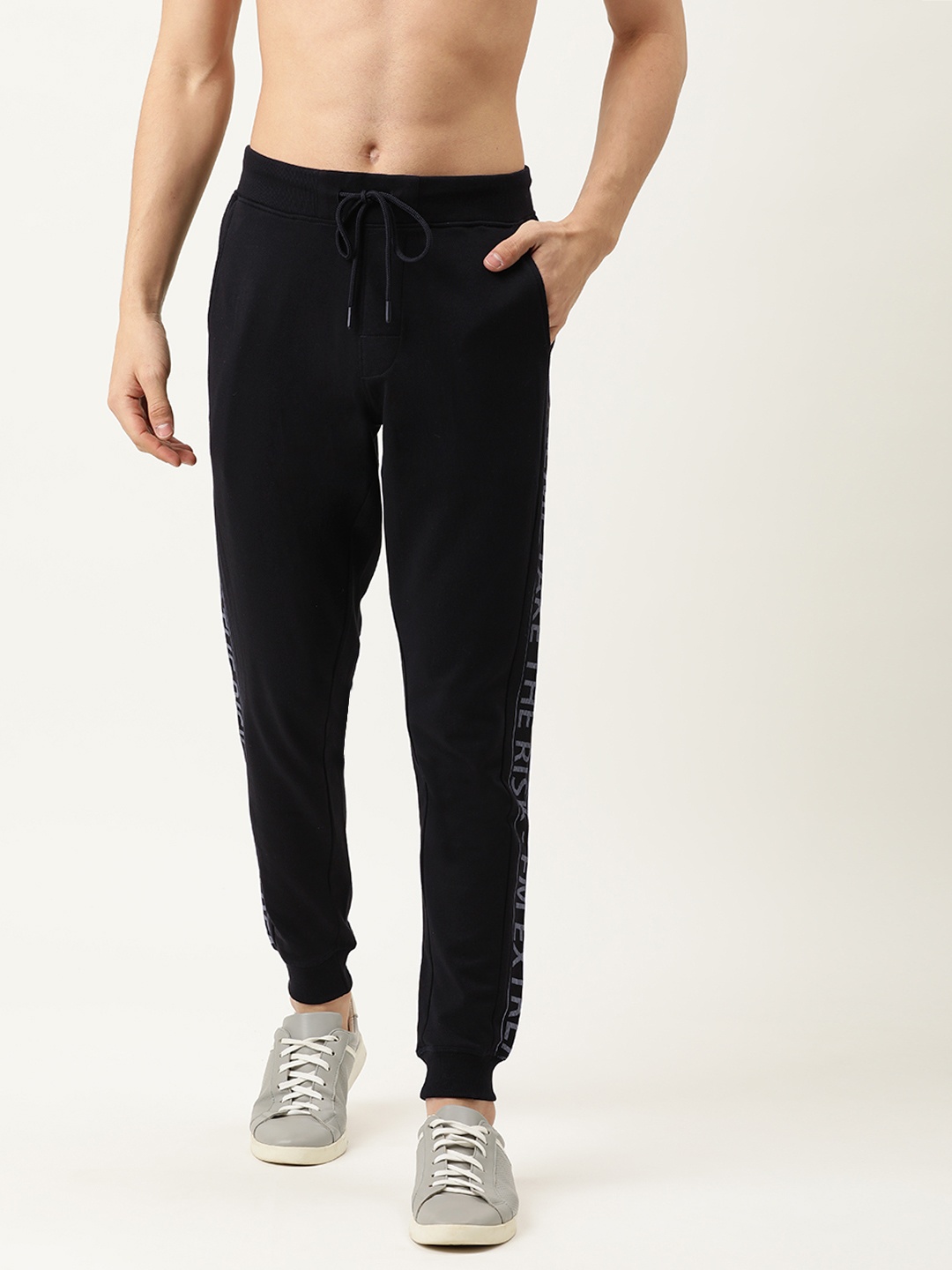 

Flying Machine Men Black Solid Pure Cotton Joggers with Side Striped Details