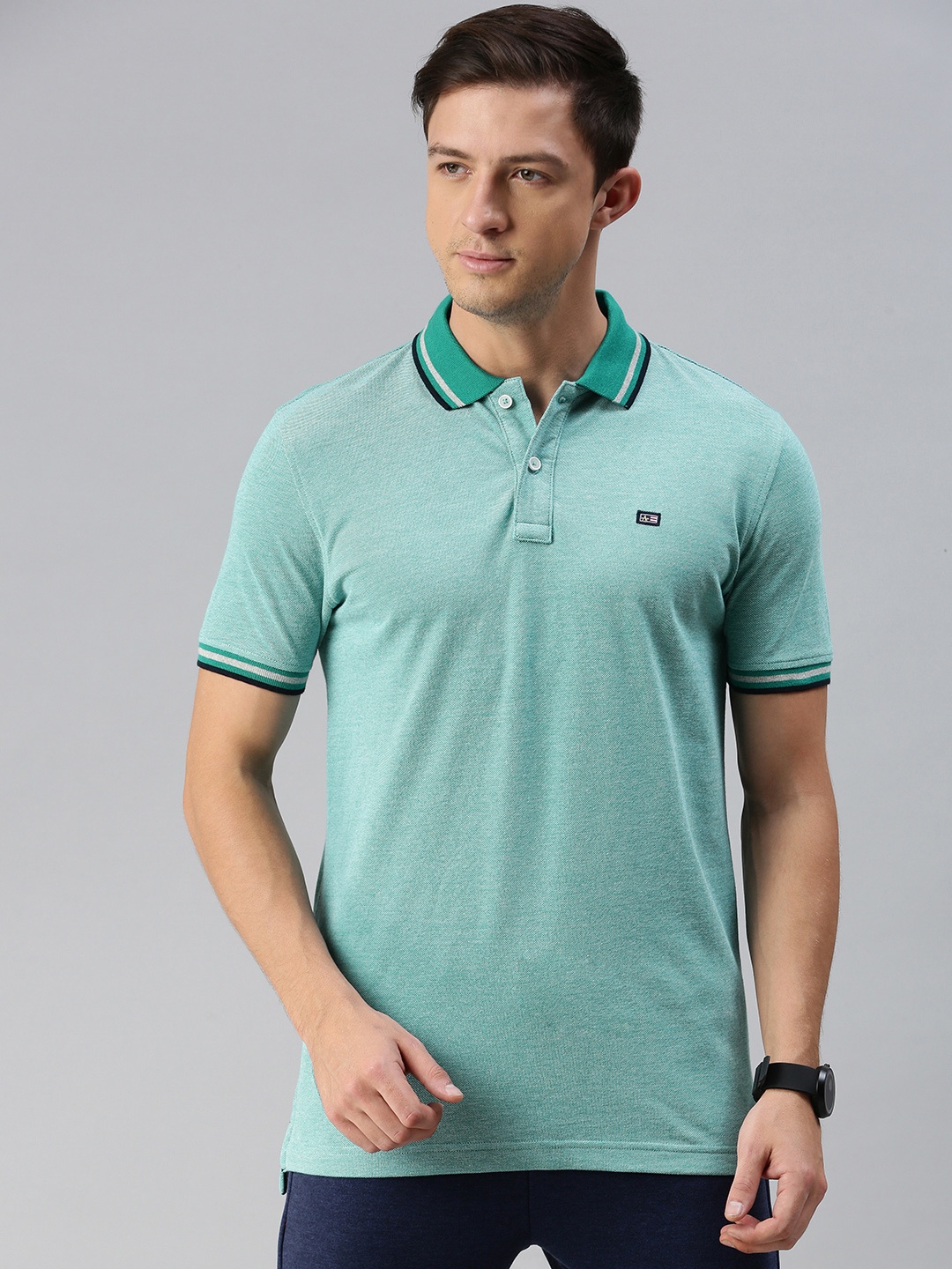 

Arrow Sport Men Green Solid Polo Collar Pure Cotton T-shirt