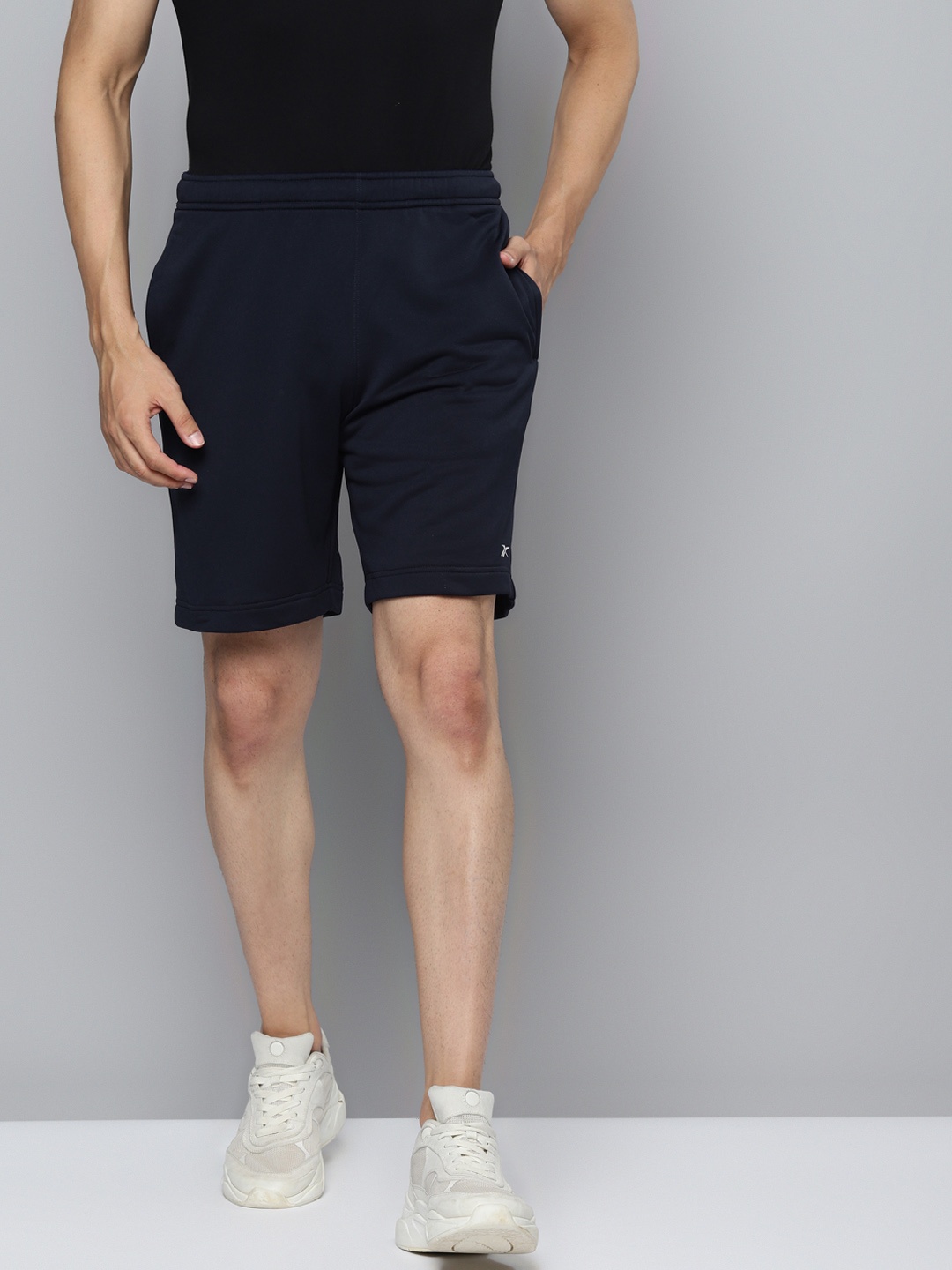 

Reebok Men Navy Blue Foundation Base Solid Training Shorts