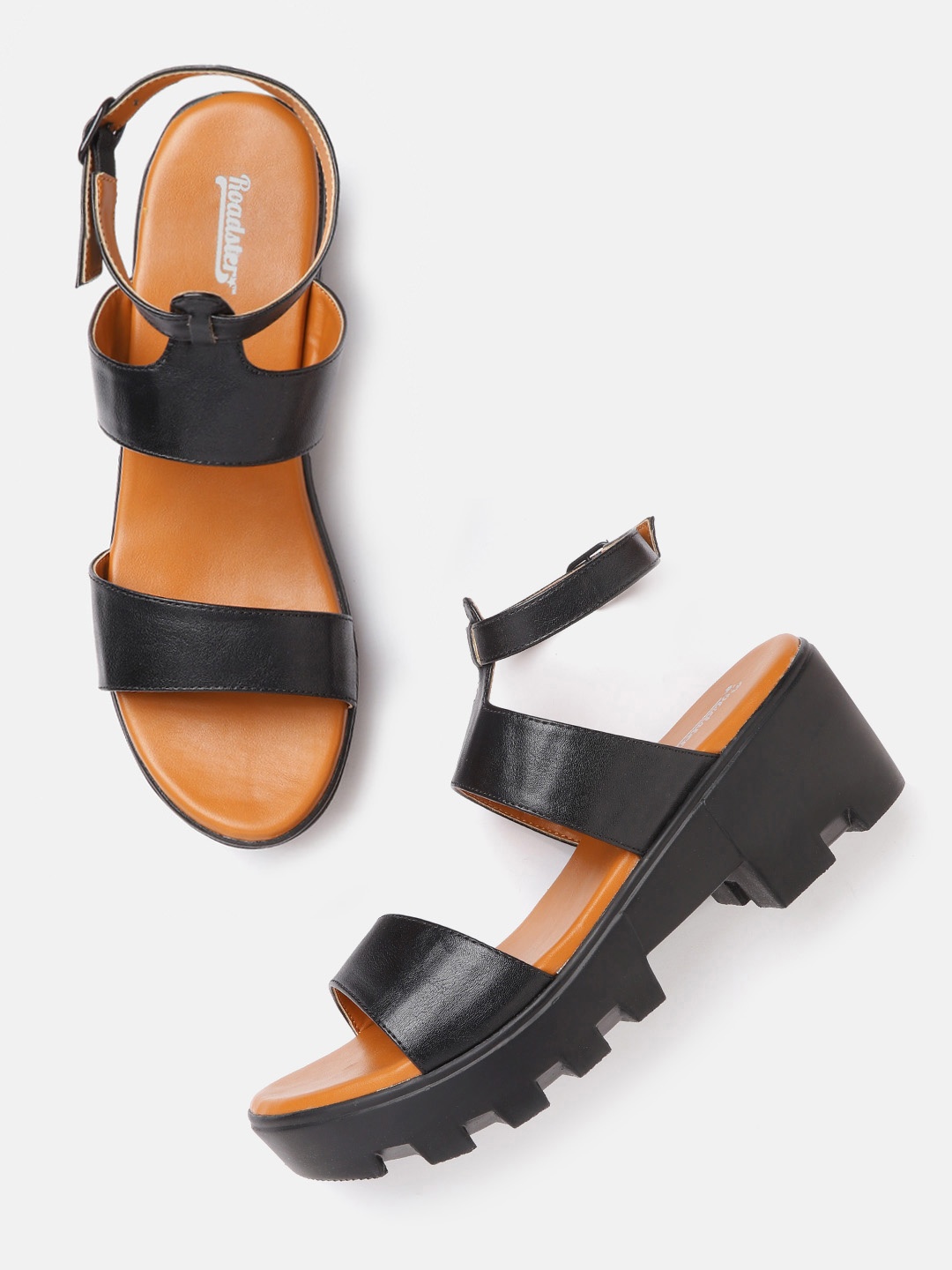 

Roadster Women Black Solid Platform Heels